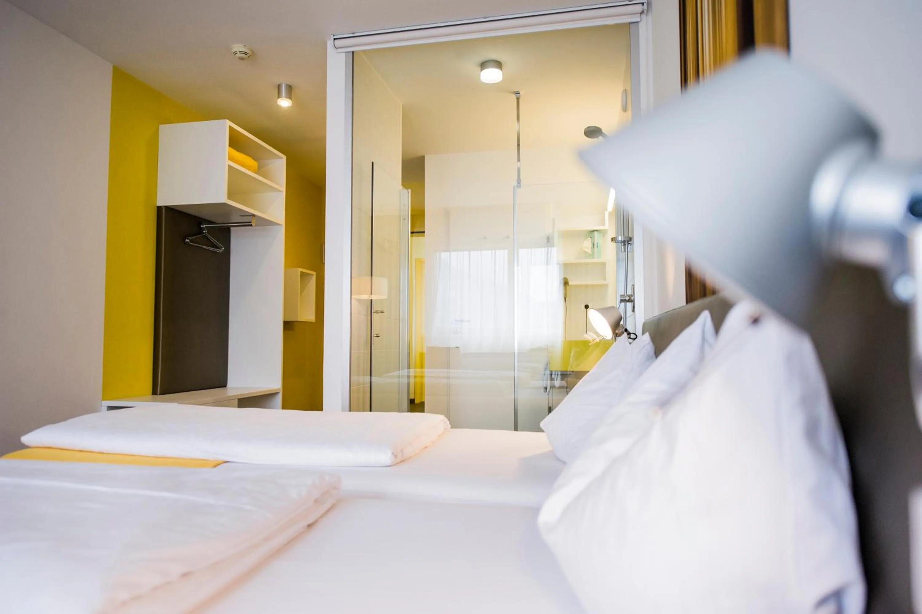 Bathroom, Bed in STAY.inn Comfort Art Hotel Schwaz