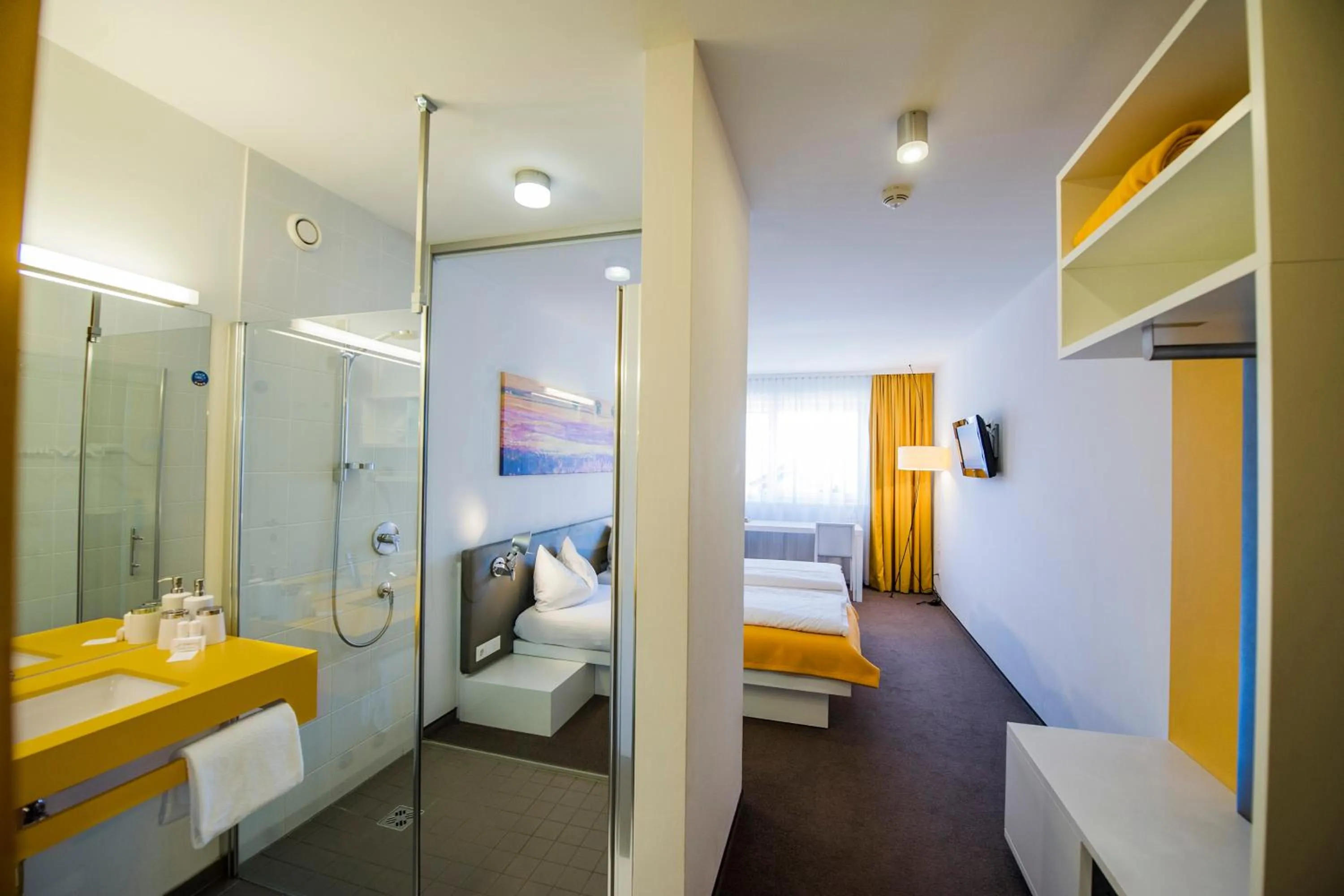 Bathroom, Bed in STAY.inn Comfort Art Hotel Schwaz