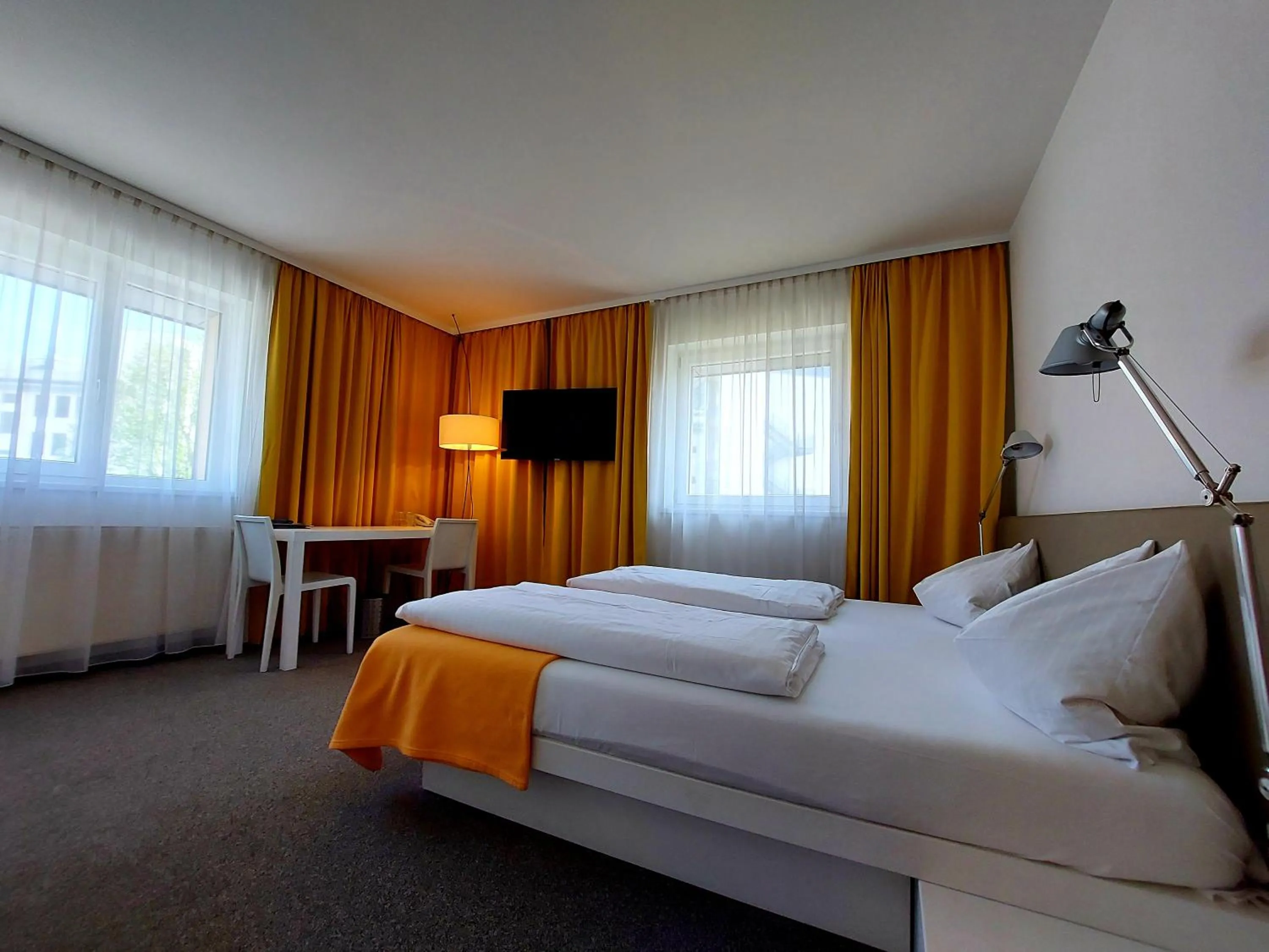 Bed in STAY.inn Comfort Art Hotel Schwaz