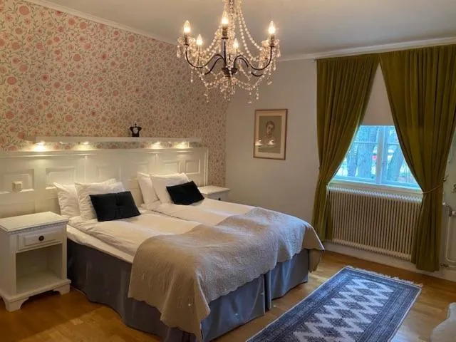 Superior Triple Room in Slottshotellet