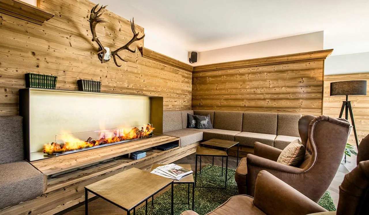 Communal lounge/ TV room in Hotel Das Essigmanngut