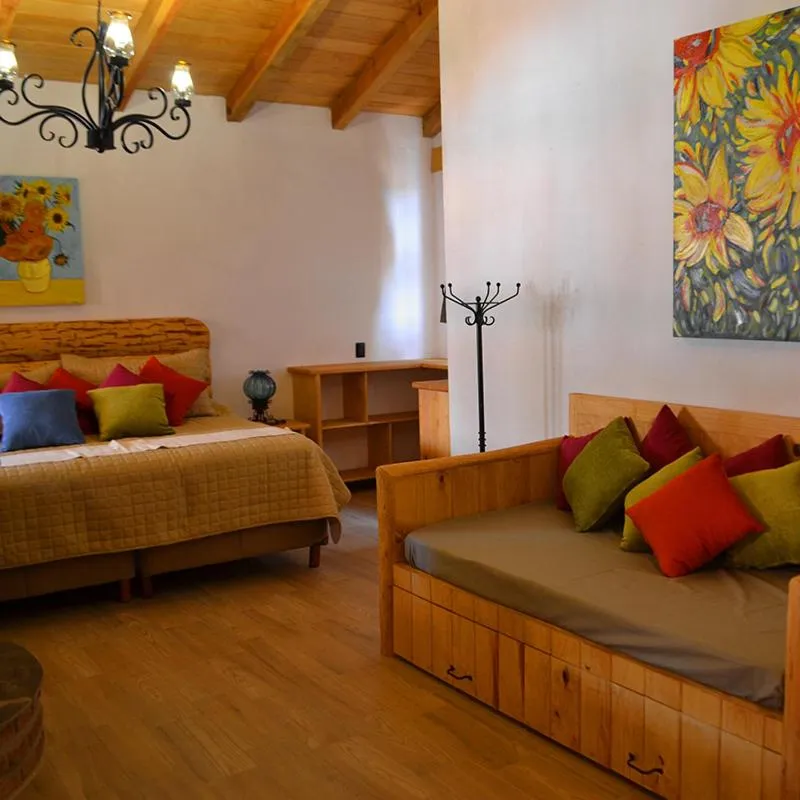 Living room, Bed in Hoteles Viva Tapalpa