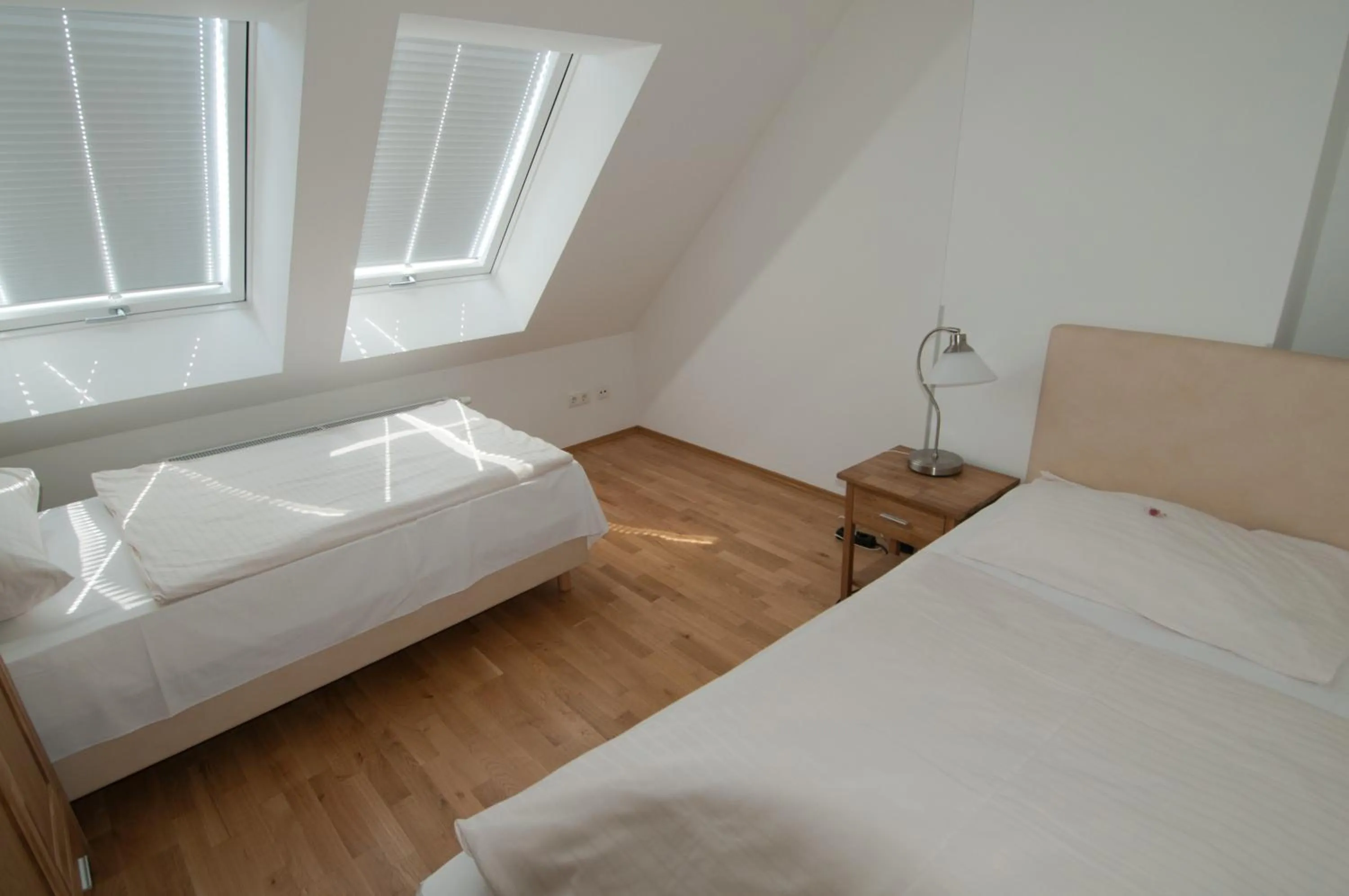 Bed in City Hotel Stockerau