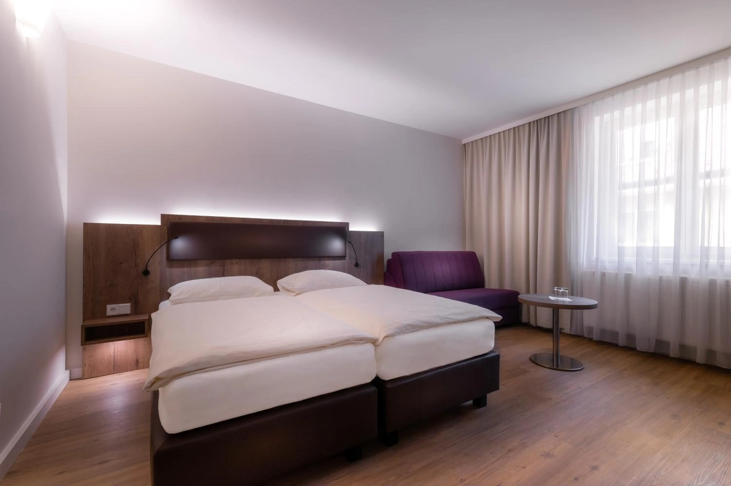 Bed in City Hotel Stockerau