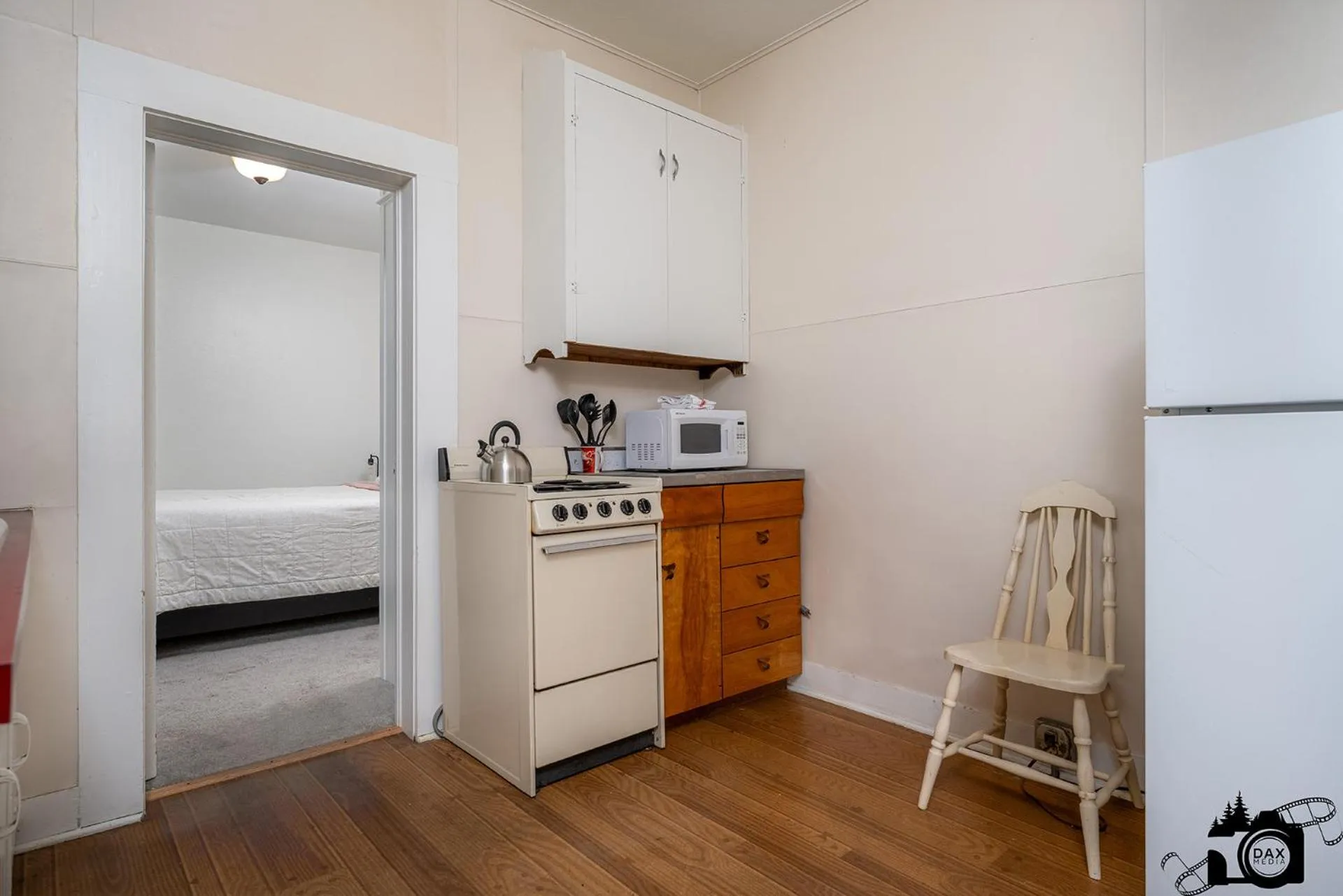 Bed in Brown & Hawkins Historical Apartments