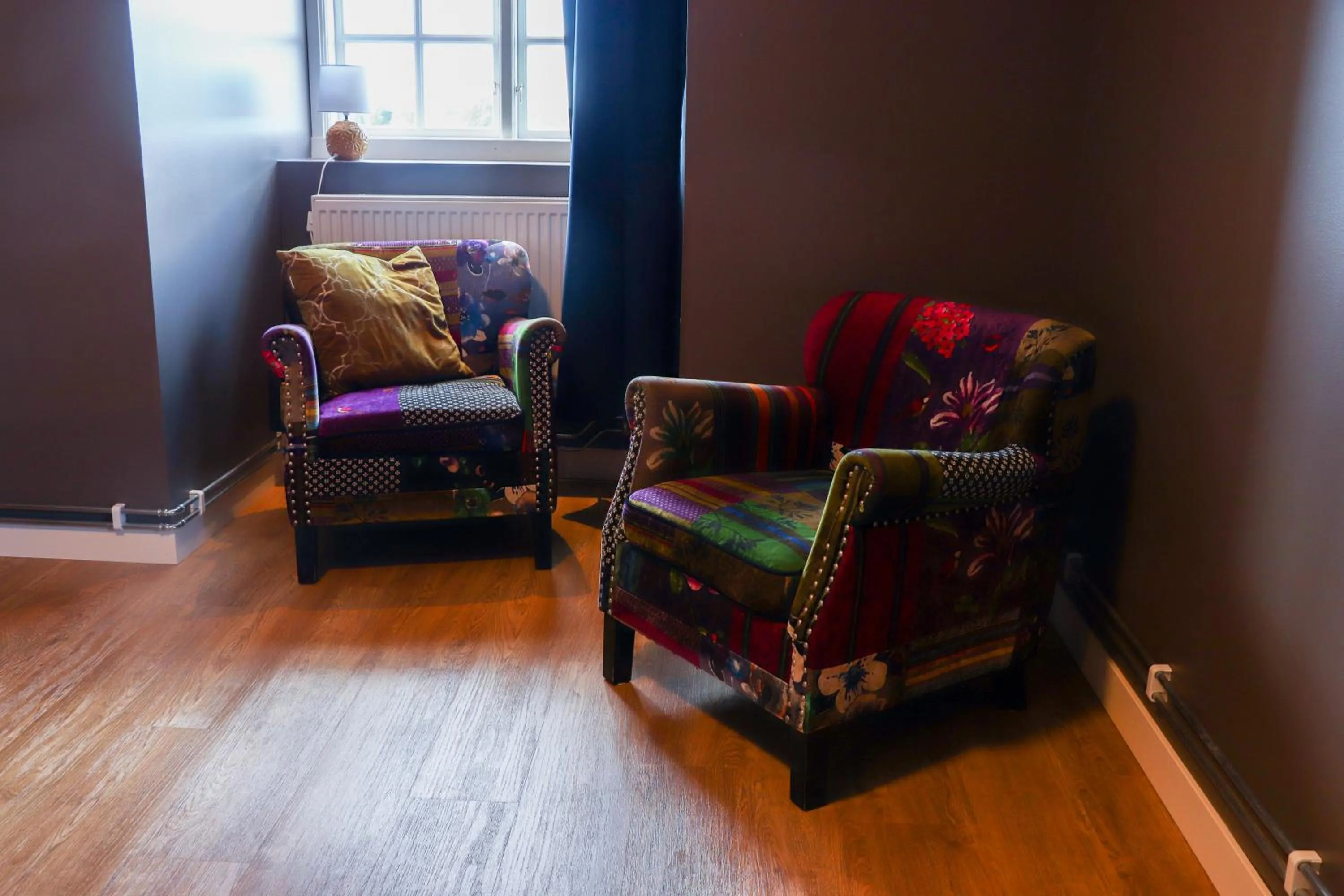 Seating area, Bed in Eksjö Stadshotell