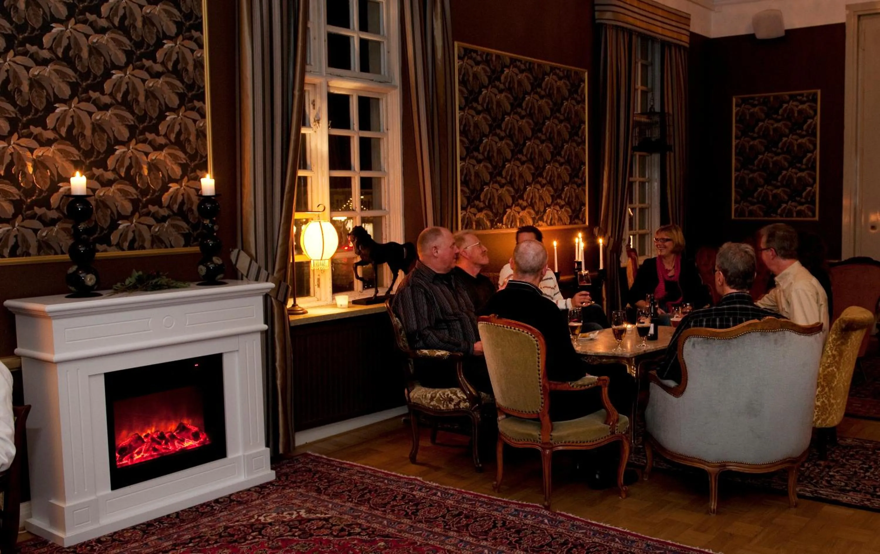 Communal lounge/ TV room in Eksjö Stadshotell