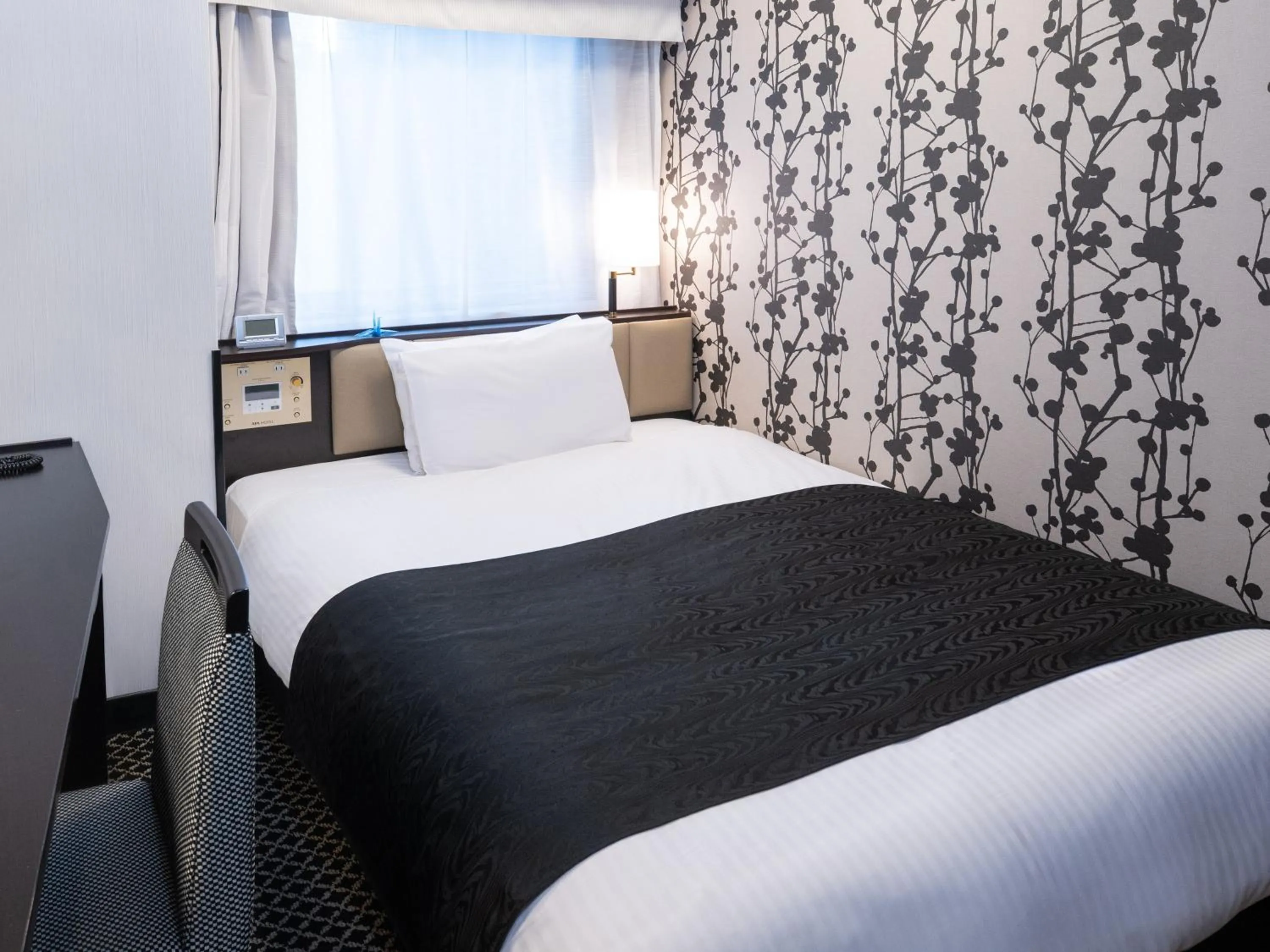 Photo of the whole room, Bed in APA Hotel Ochanomizu Ekikita