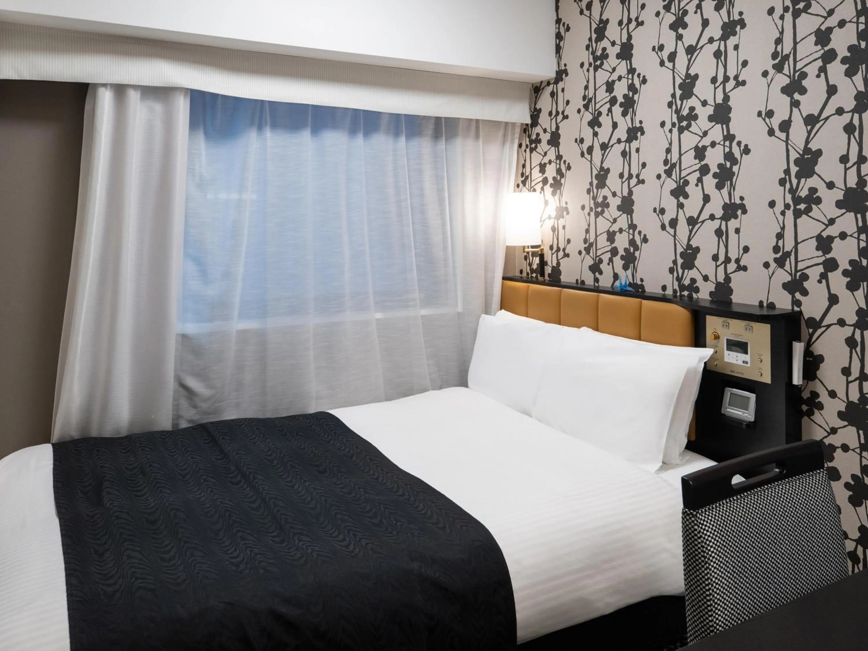 Photo of the whole room, Bed in APA Hotel Ochanomizu Ekikita