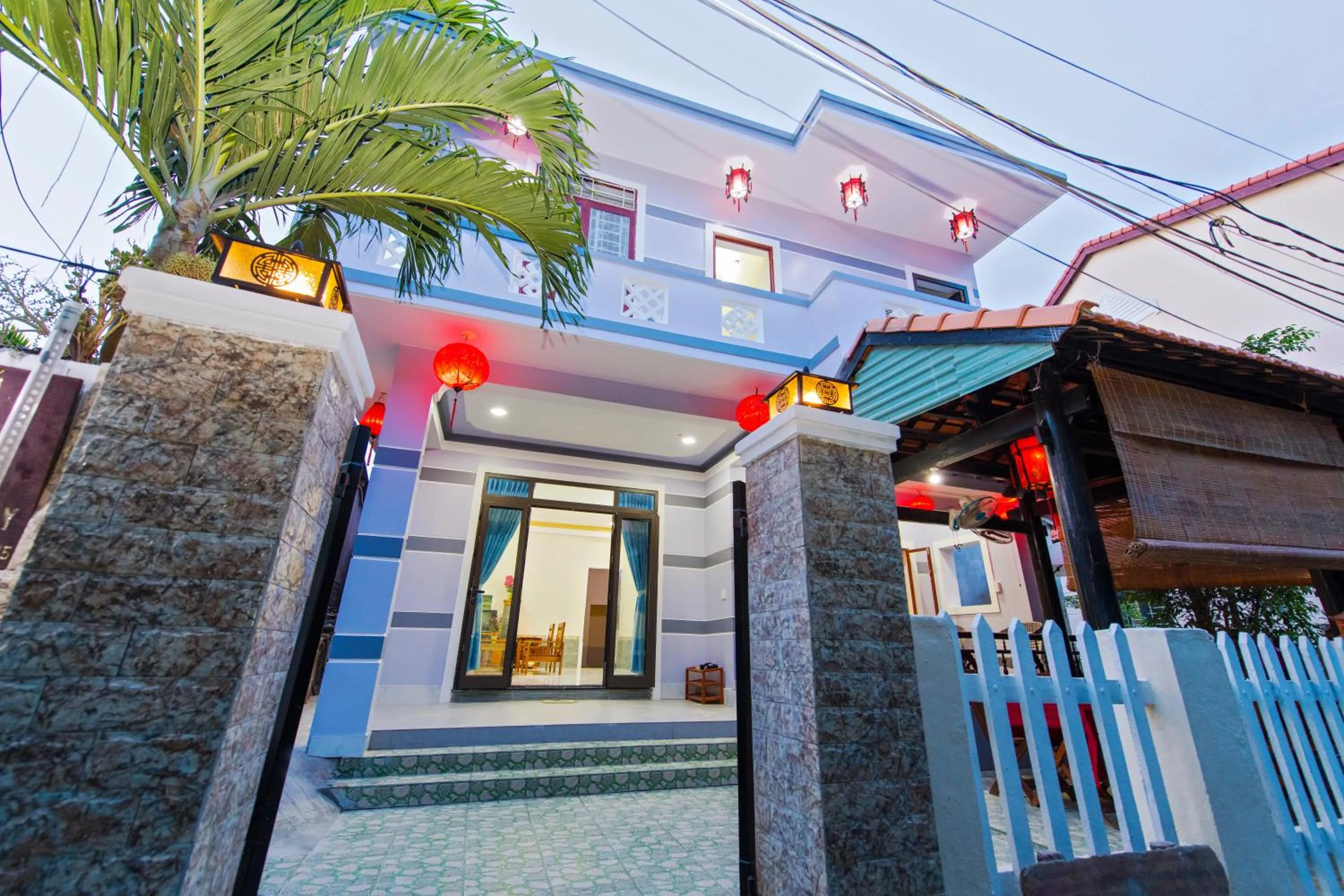 Property building in Bougain Villeas Homestay