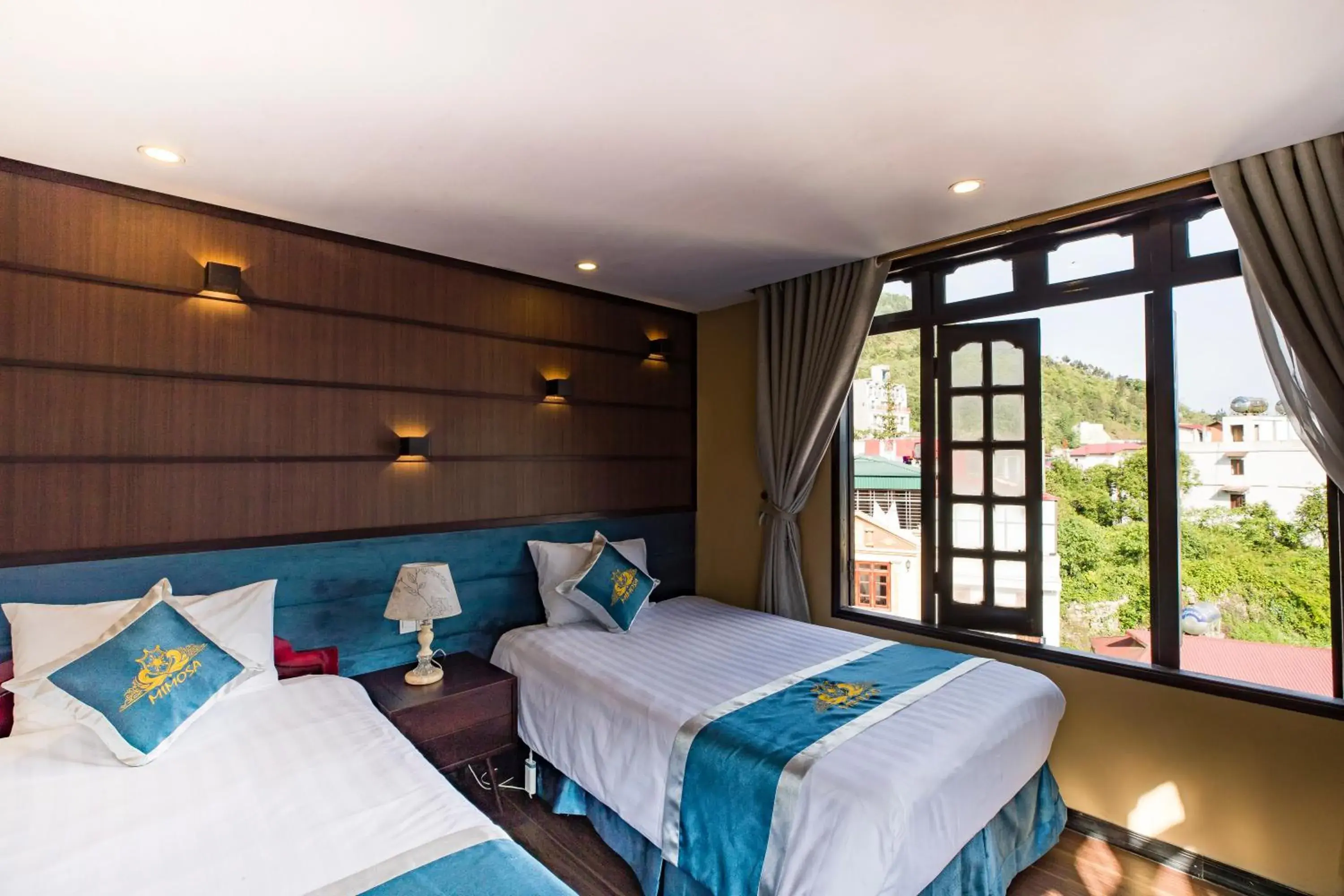 Twin Room with Mountain View in Mimosa Hotel Sapa Twin Room with Mountain View in Mimosa Hotel Sapa