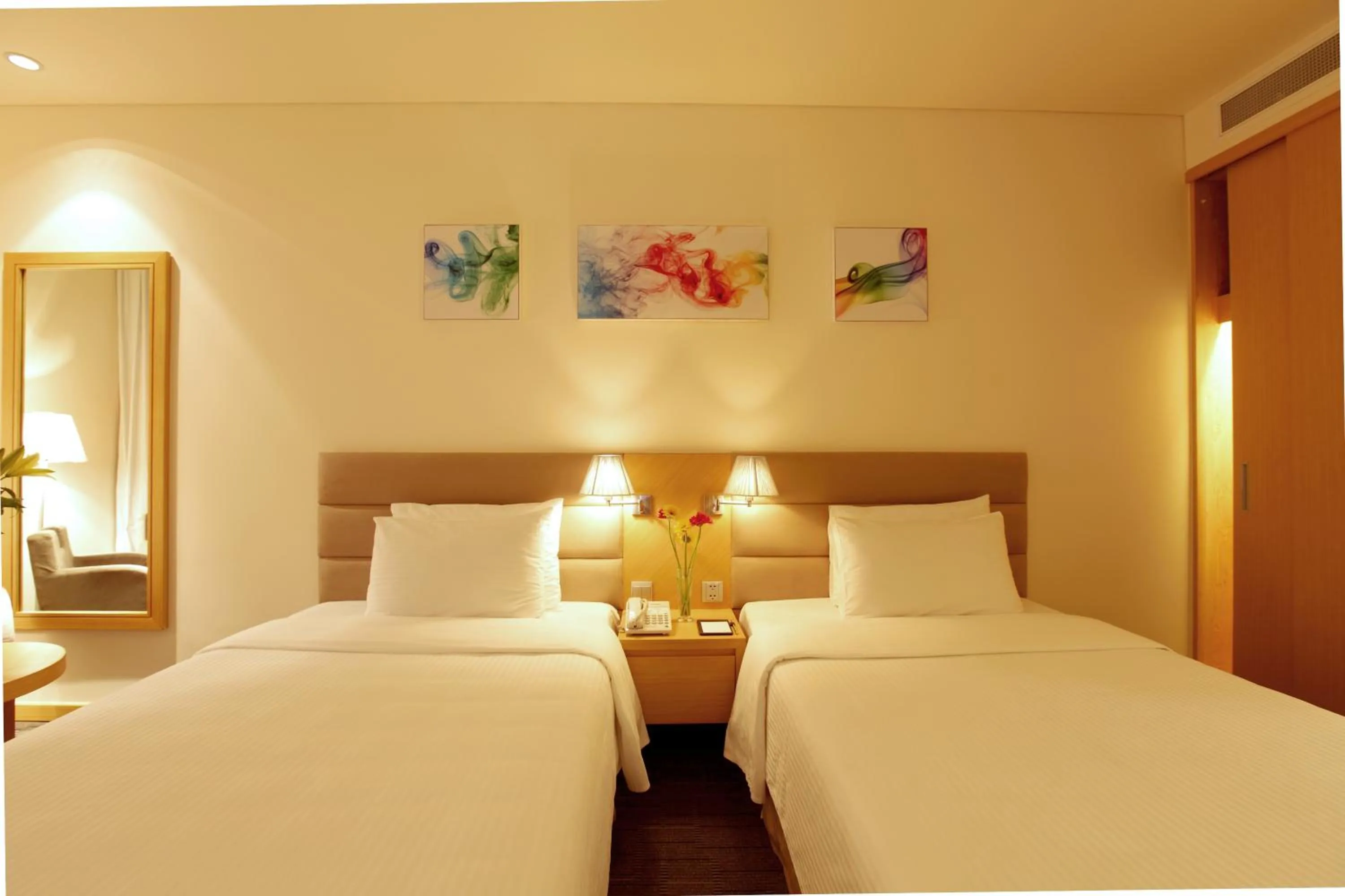 Bed in Liberty Central Saigon Centre Hotel