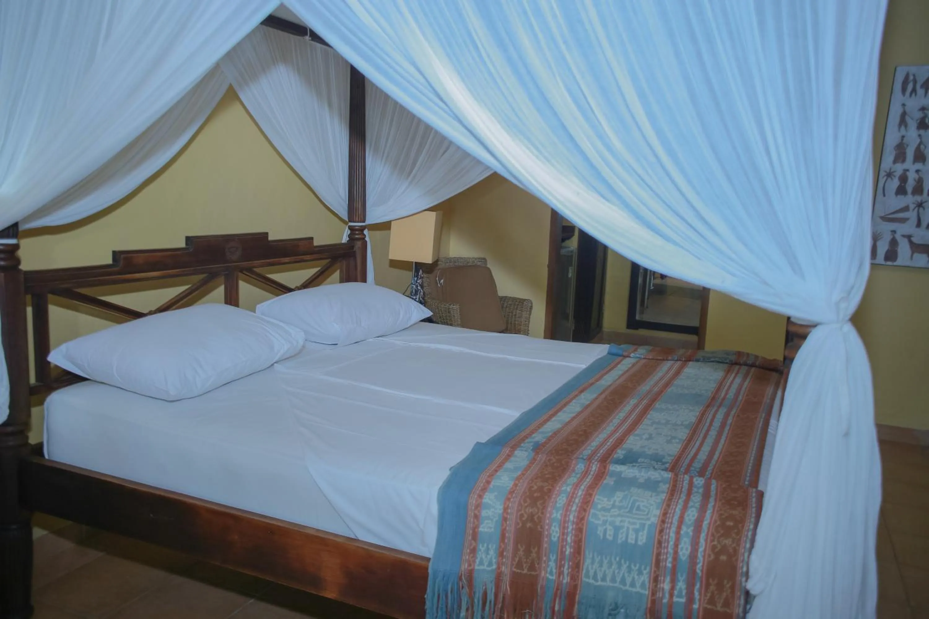Bed in Sea World Club Beach Resort & Dive Center, RESORT THAT SUPPORTS THE POOR