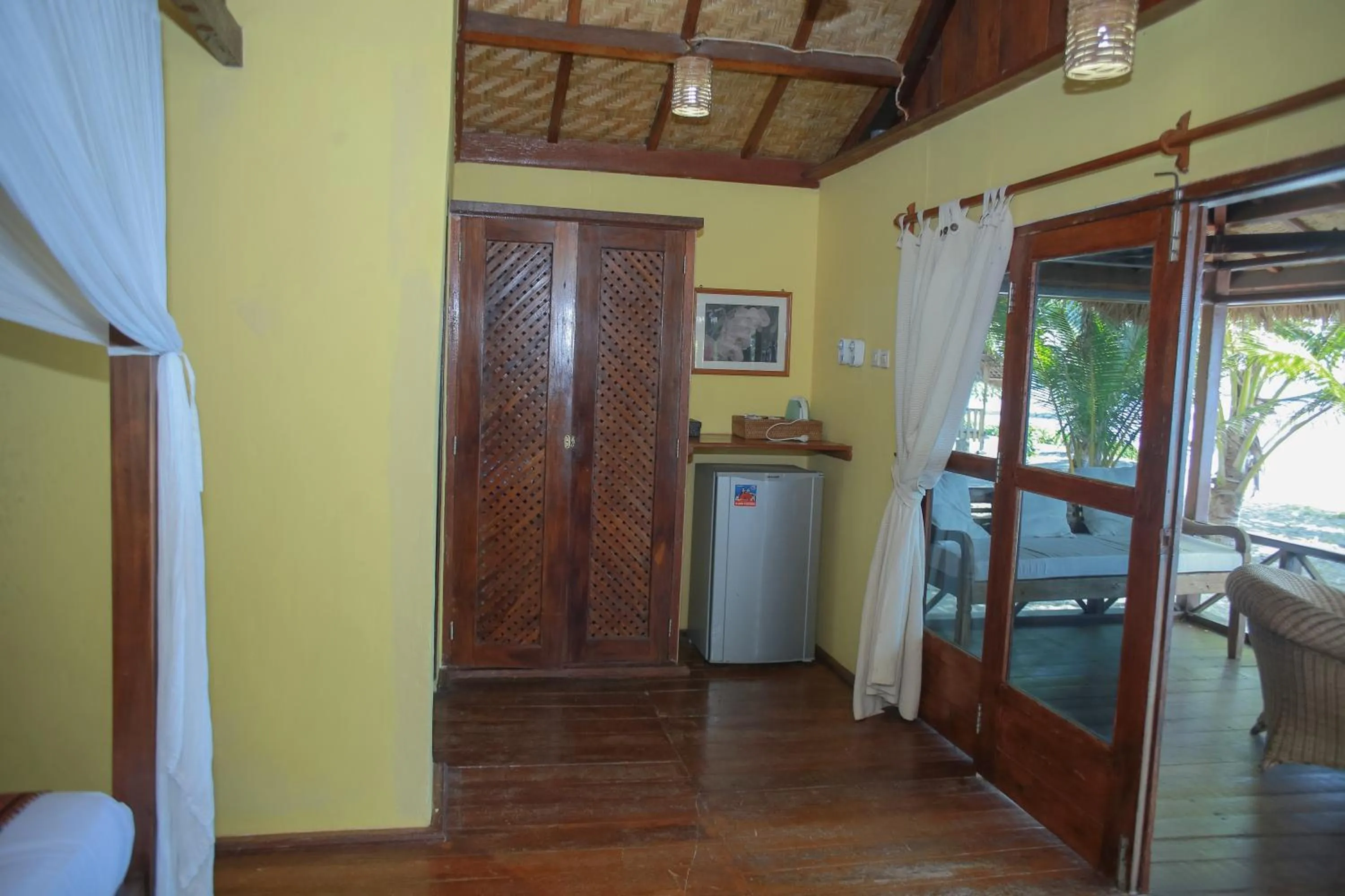 Bed in Sea World Club Beach Resort & Dive Center, RESORT THAT SUPPORTS THE POOR