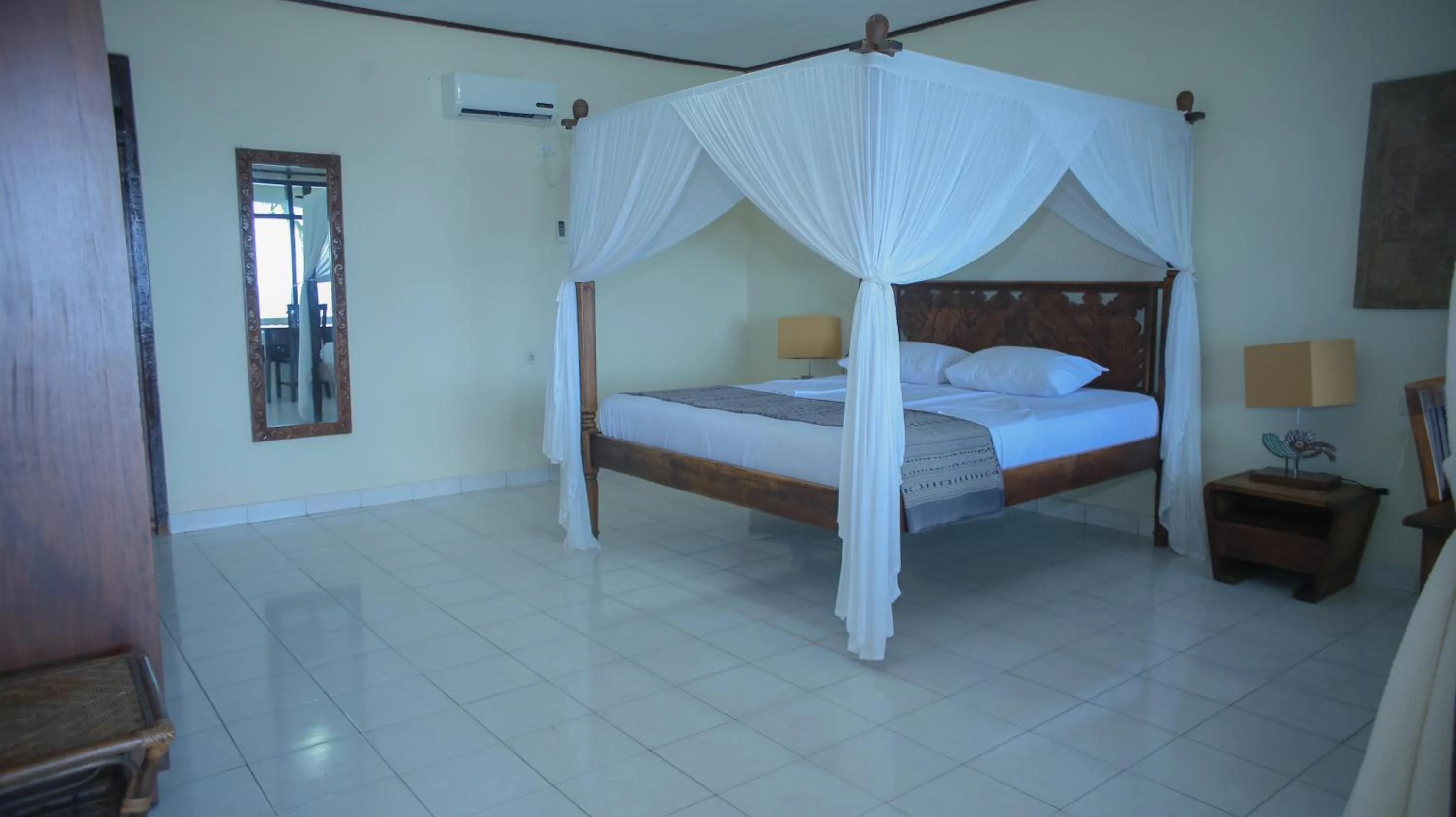Bed in Sea World Club Beach Resort & Dive Center, RESORT THAT SUPPORTS THE POOR