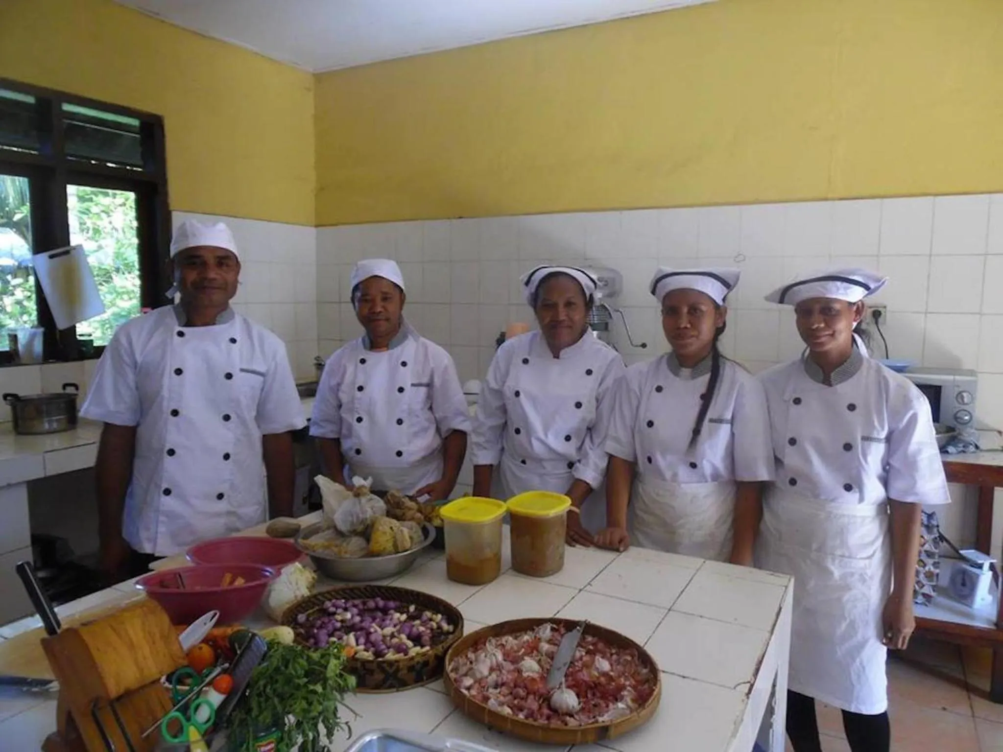 Staff in Sea World Club Beach Resort & Dive Center, RESORT THAT SUPPORTS THE POOR