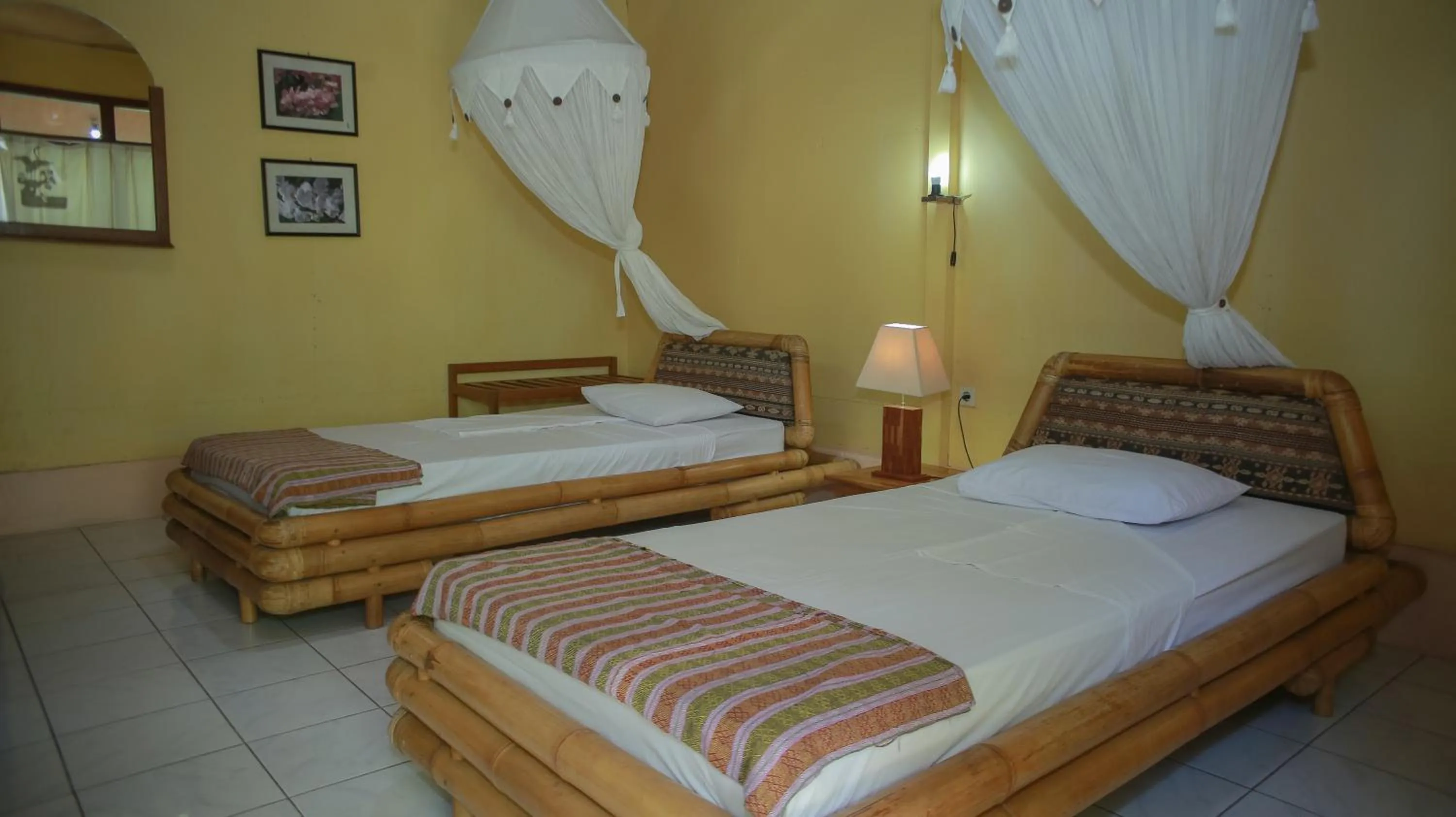 Bed in Sea World Club Beach Resort & Dive Center, RESORT THAT SUPPORTS THE POOR