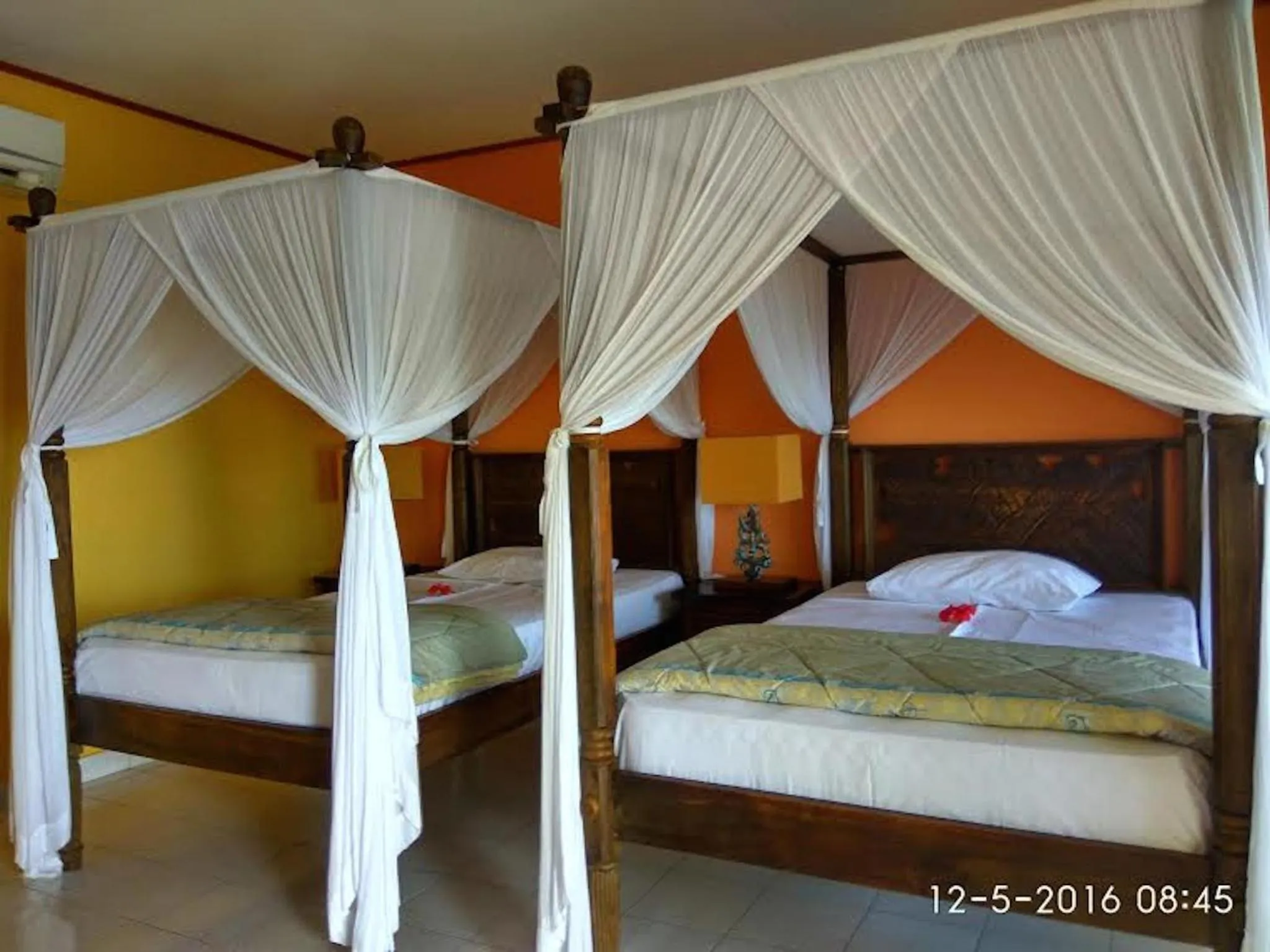 Bed in Sea World Club Beach Resort & Dive Center, RESORT THAT SUPPORTS THE POOR
