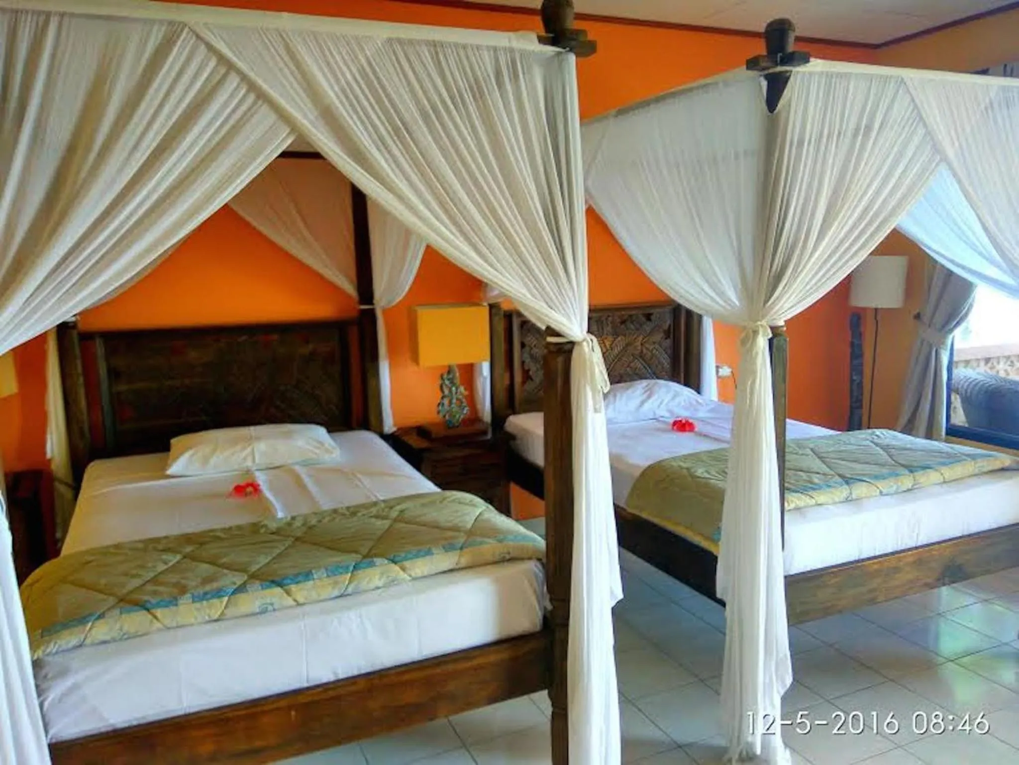 Bed in Sea World Club Beach Resort & Dive Center, RESORT THAT SUPPORTS THE POOR