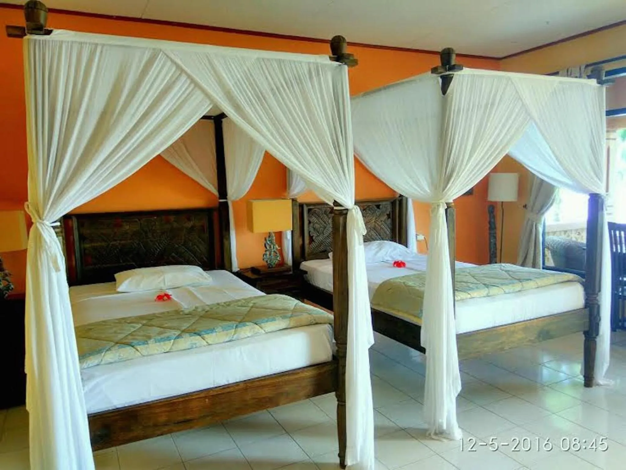 Shower, Bed in Sea World Club Beach Resort & Dive Center, RESORT THAT SUPPORTS THE POOR