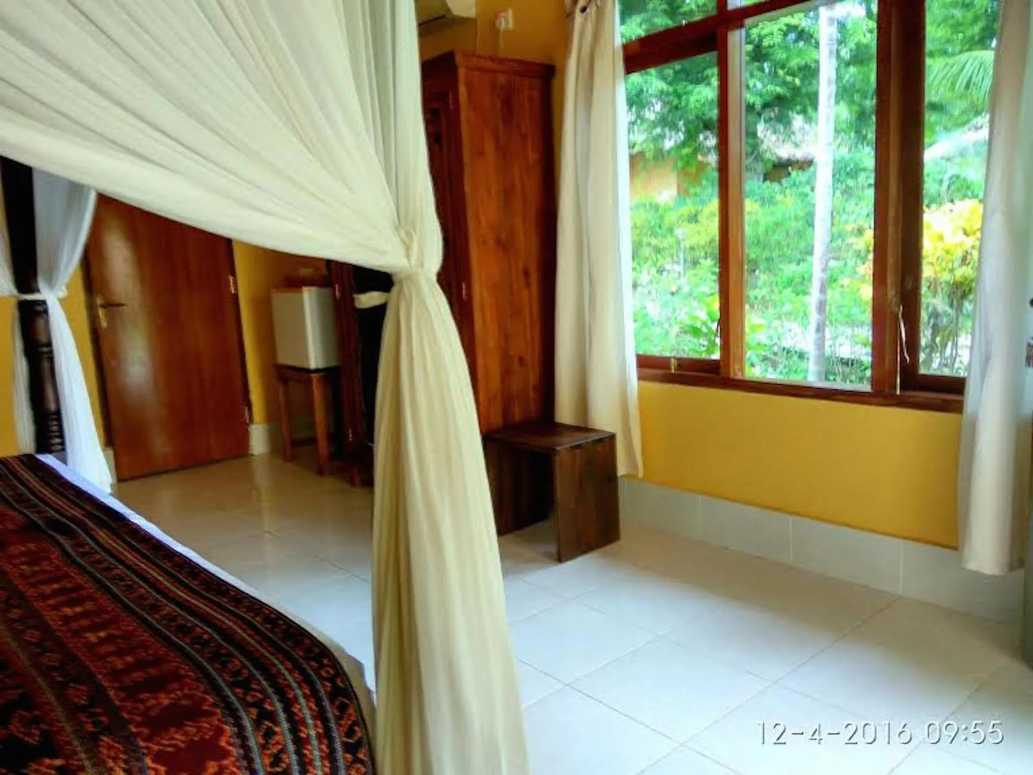 Bedroom, Bed in Sea World Club Beach Resort & Dive Center, RESORT THAT SUPPORTS THE POOR