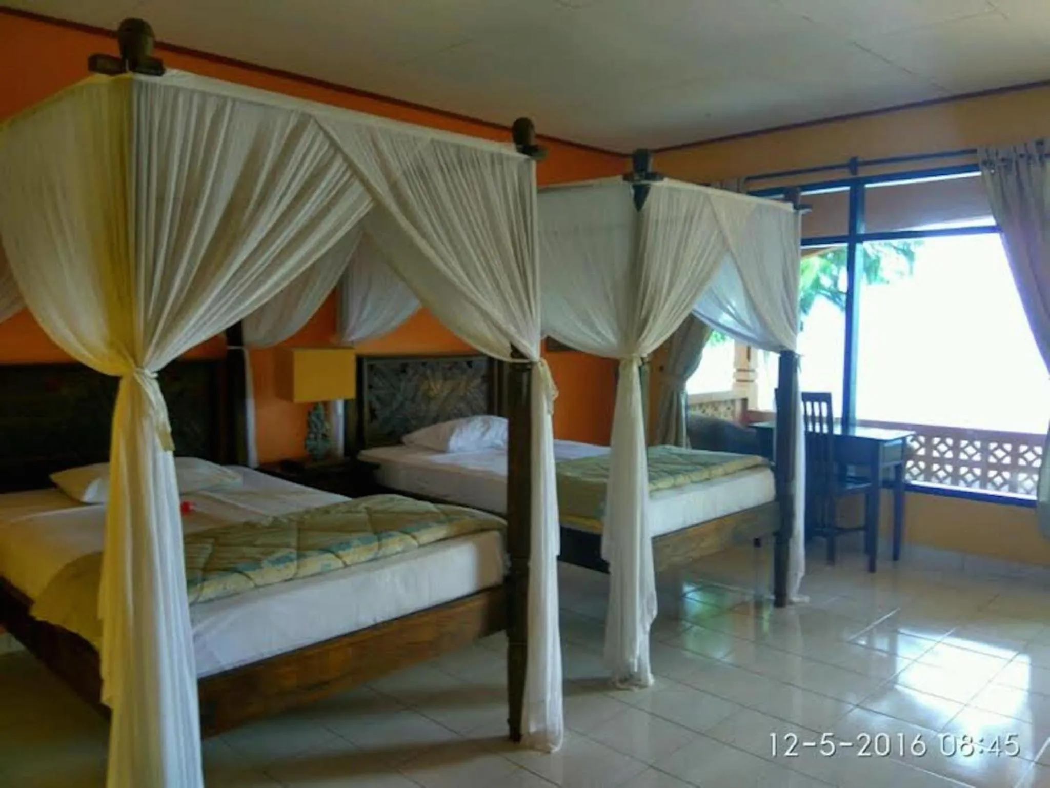 Bed in Sea World Club Beach Resort & Dive Center, RESORT THAT SUPPORTS THE POOR