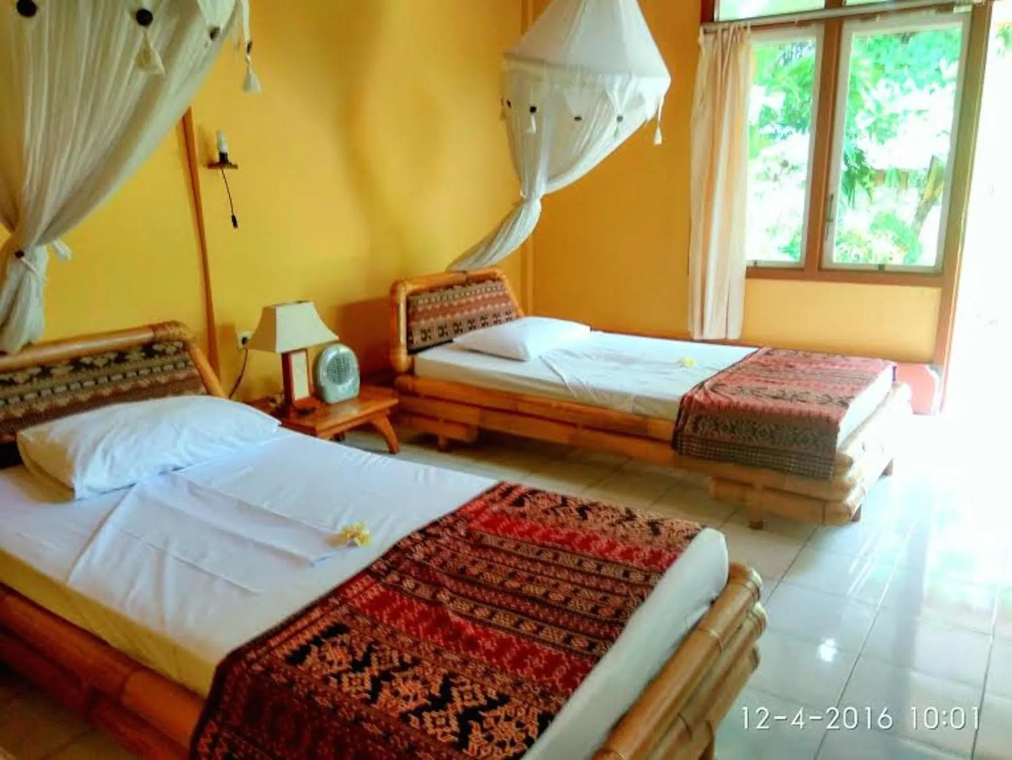 Bed in Sea World Club Beach Resort & Dive Center, RESORT THAT SUPPORTS THE POOR