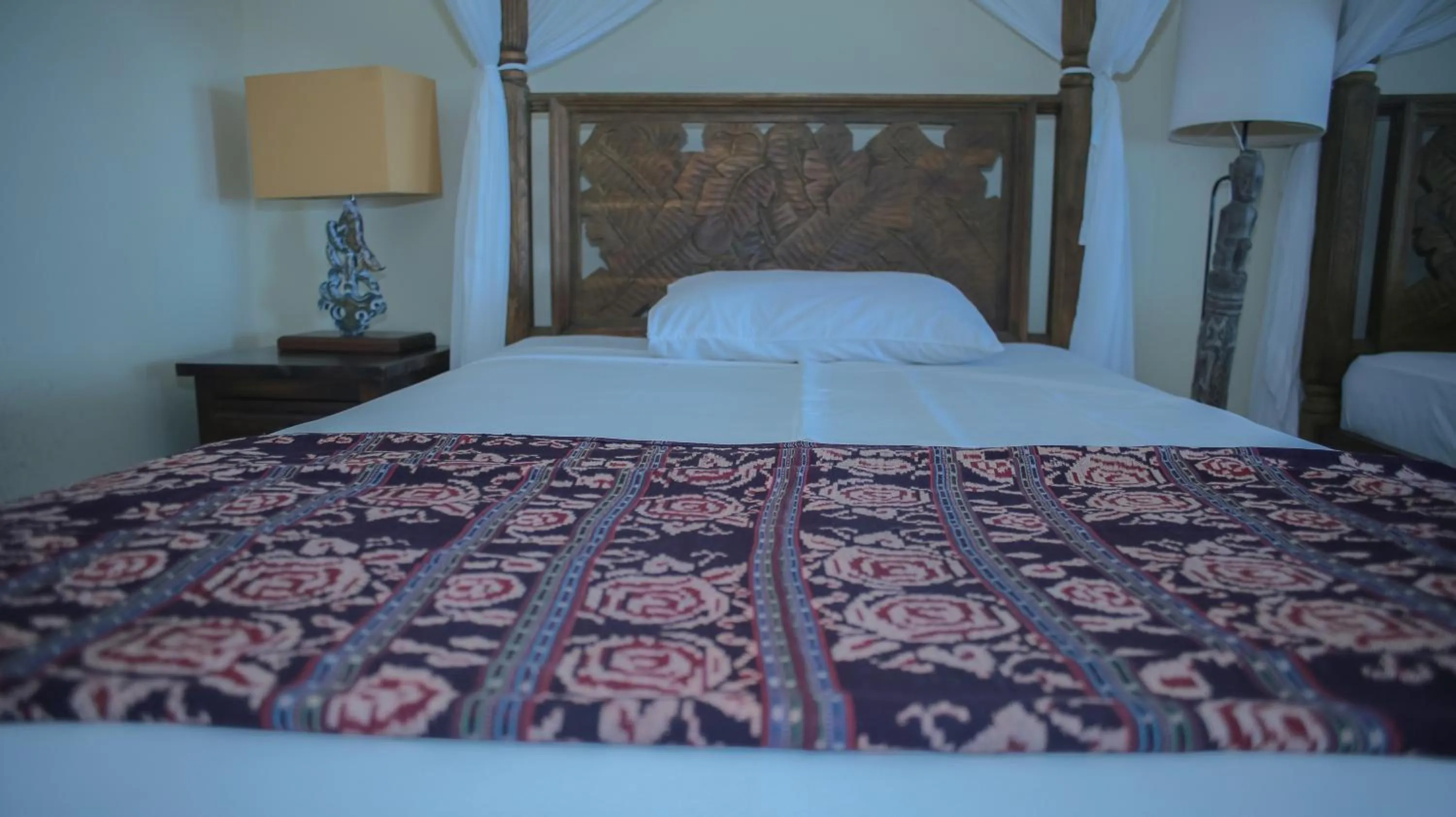 Bed in Sea World Club Beach Resort & Dive Center, RESORT THAT SUPPORTS THE POOR