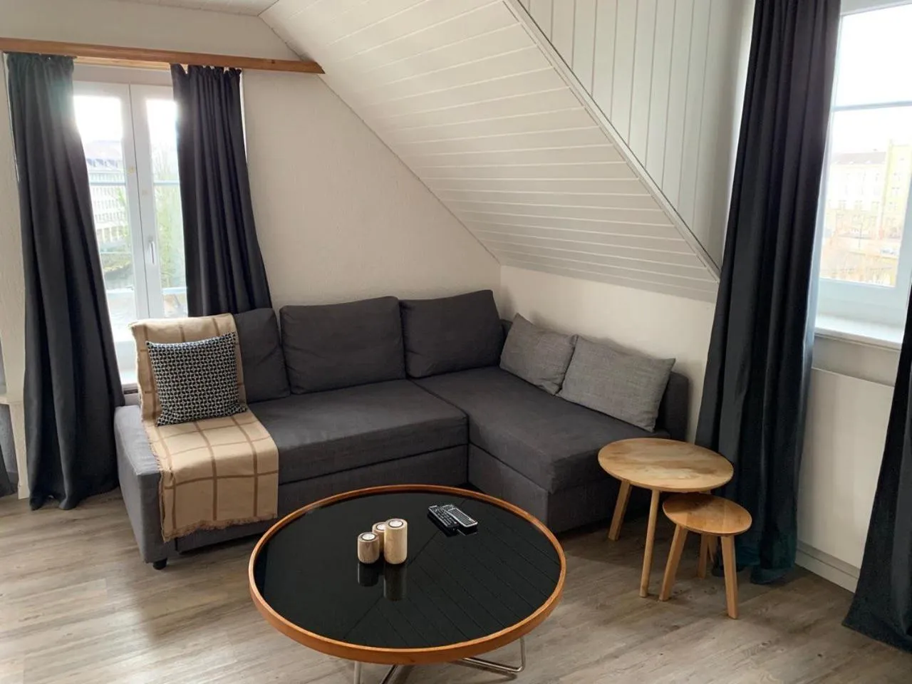 Living room in Löwenplatz Apartment near Station by Airhome