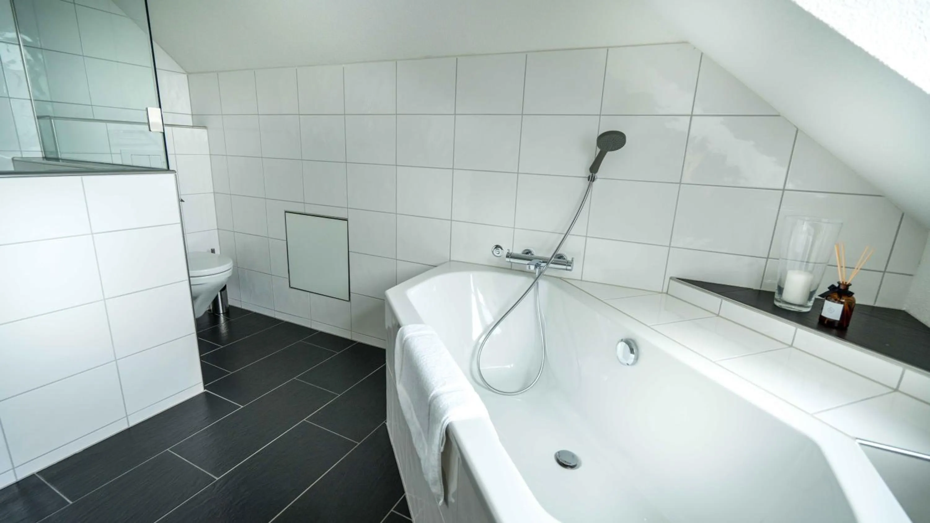 Bathroom in Löwenplatz Apartment near Station by Airhome