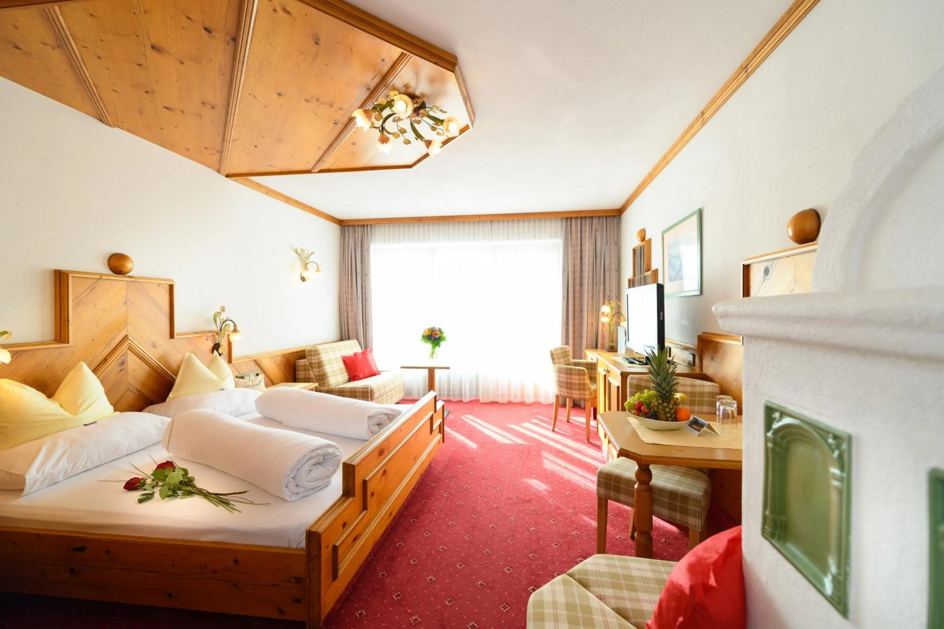 Photo of the whole room, Bed in Alpenpark Resort Superior