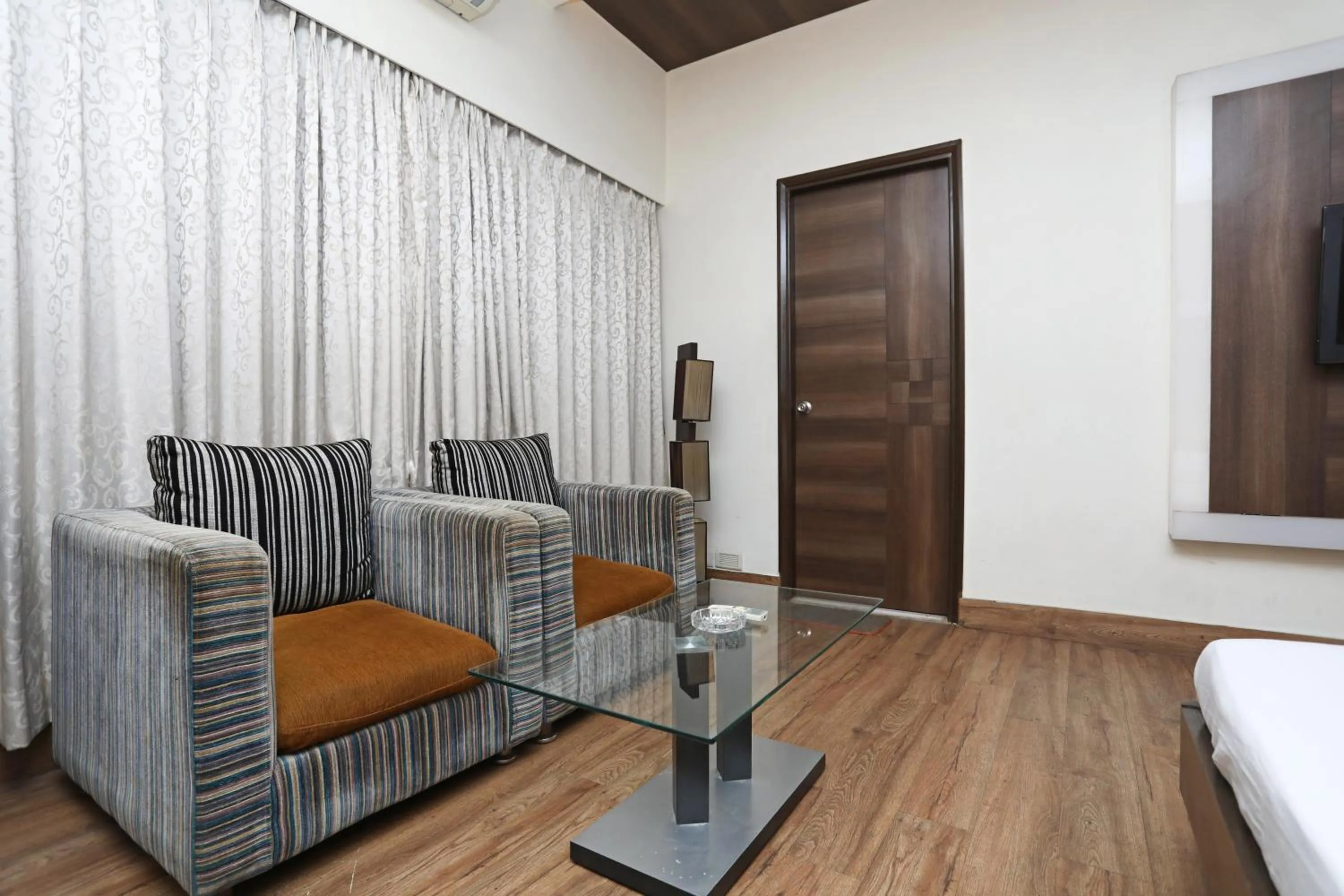 Seating area in Hotel Rushabh Home