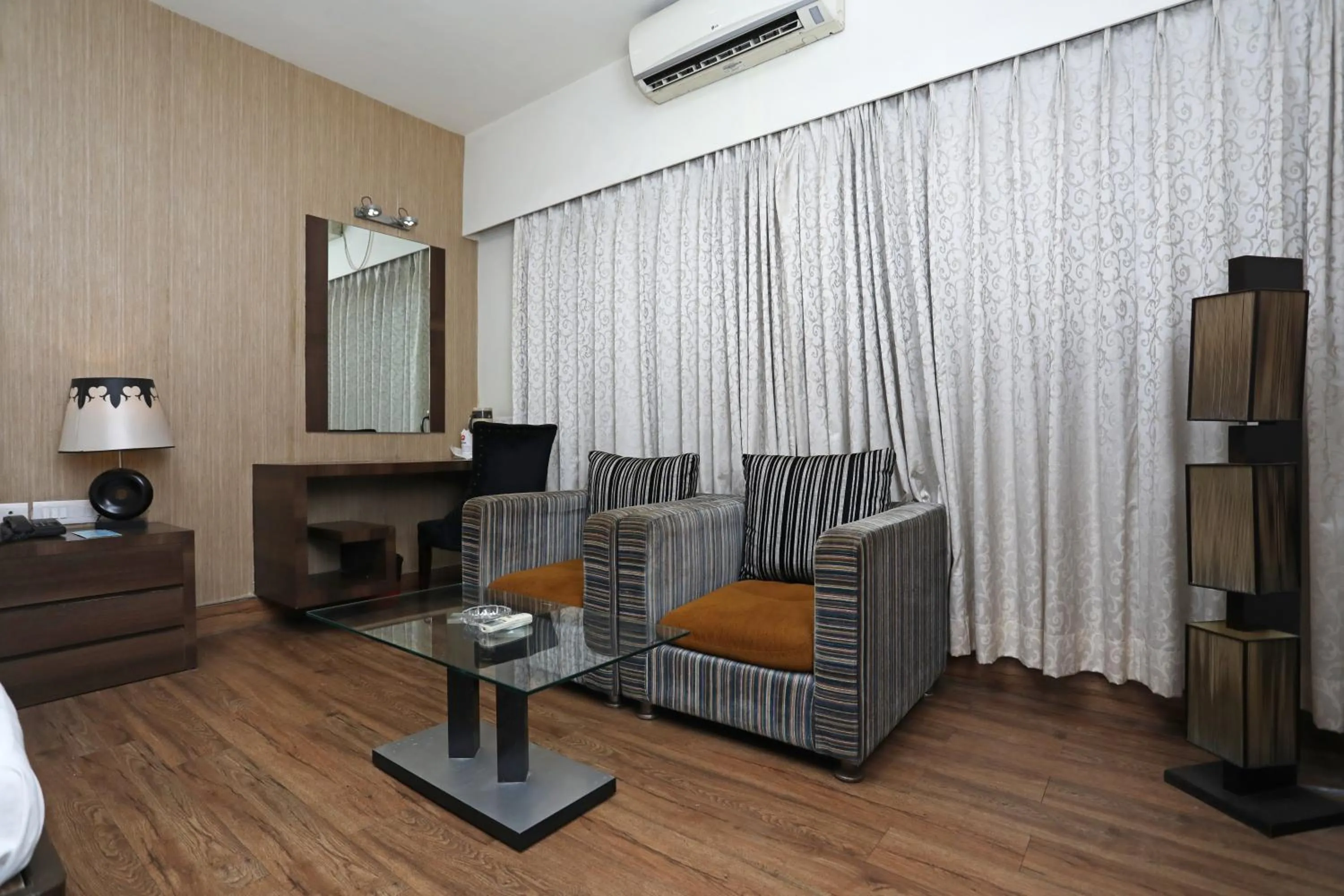 Seating area in Hotel Rushabh Home