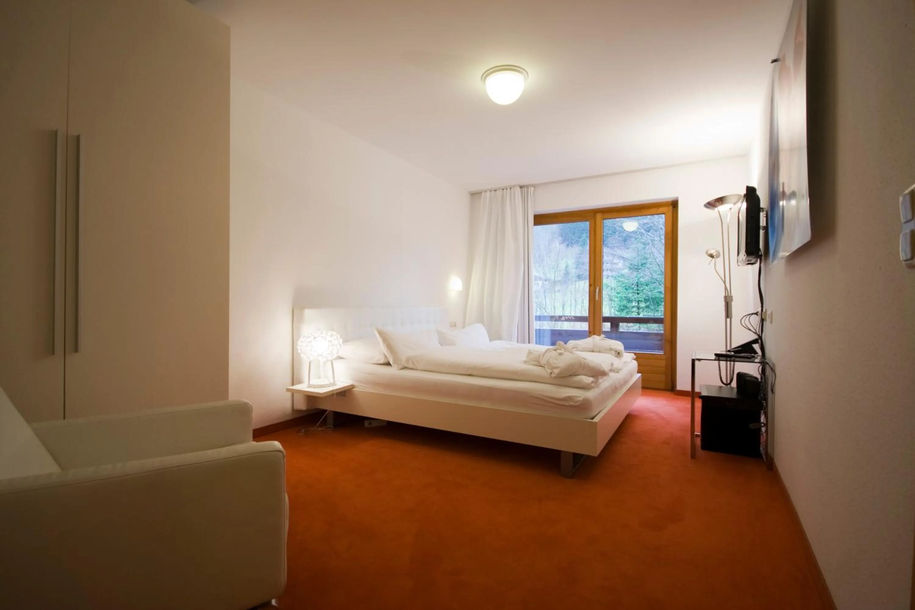 Photo of the whole room, Bed in Walliserhof