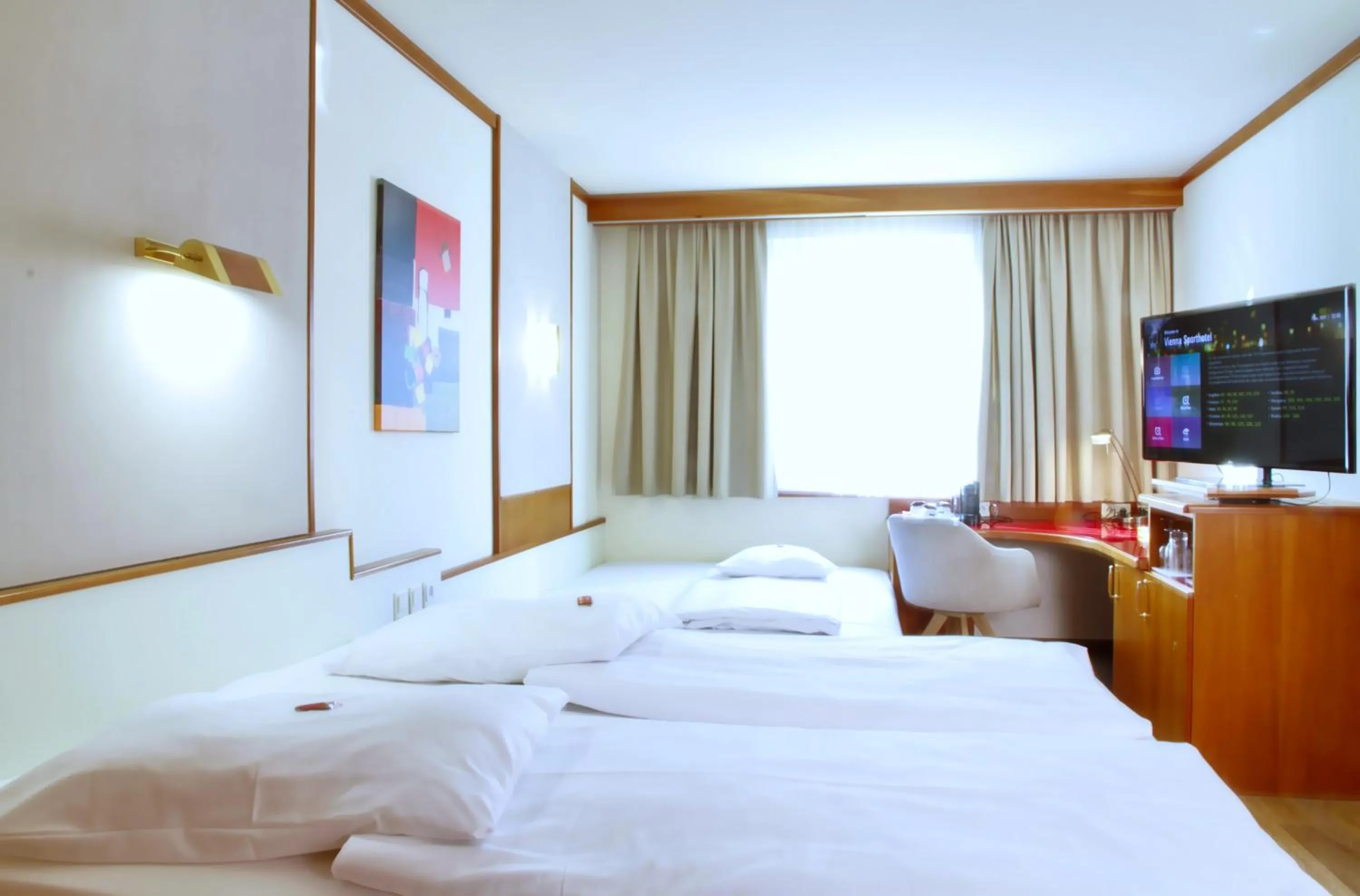 Bed in Vienna Sporthotel