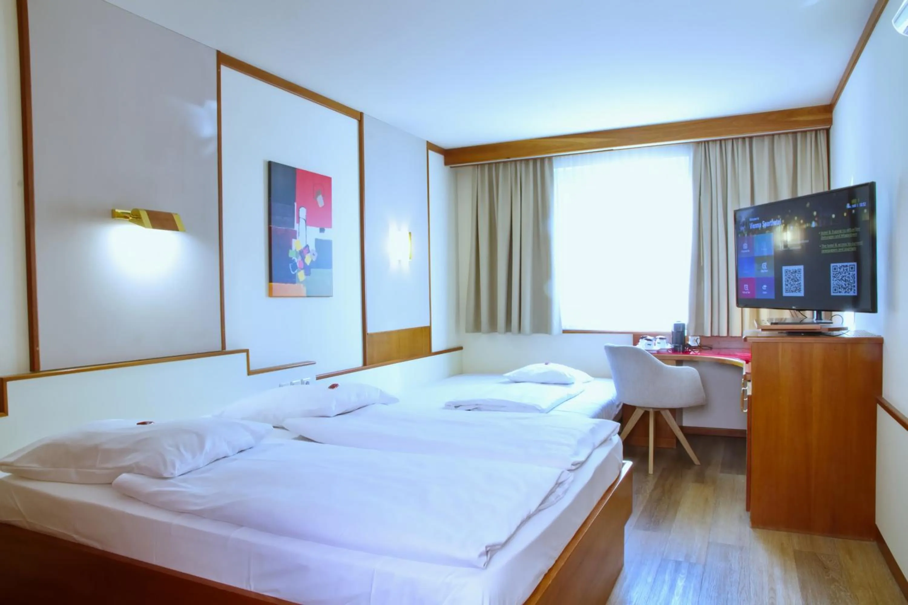 Bed in Vienna Sporthotel