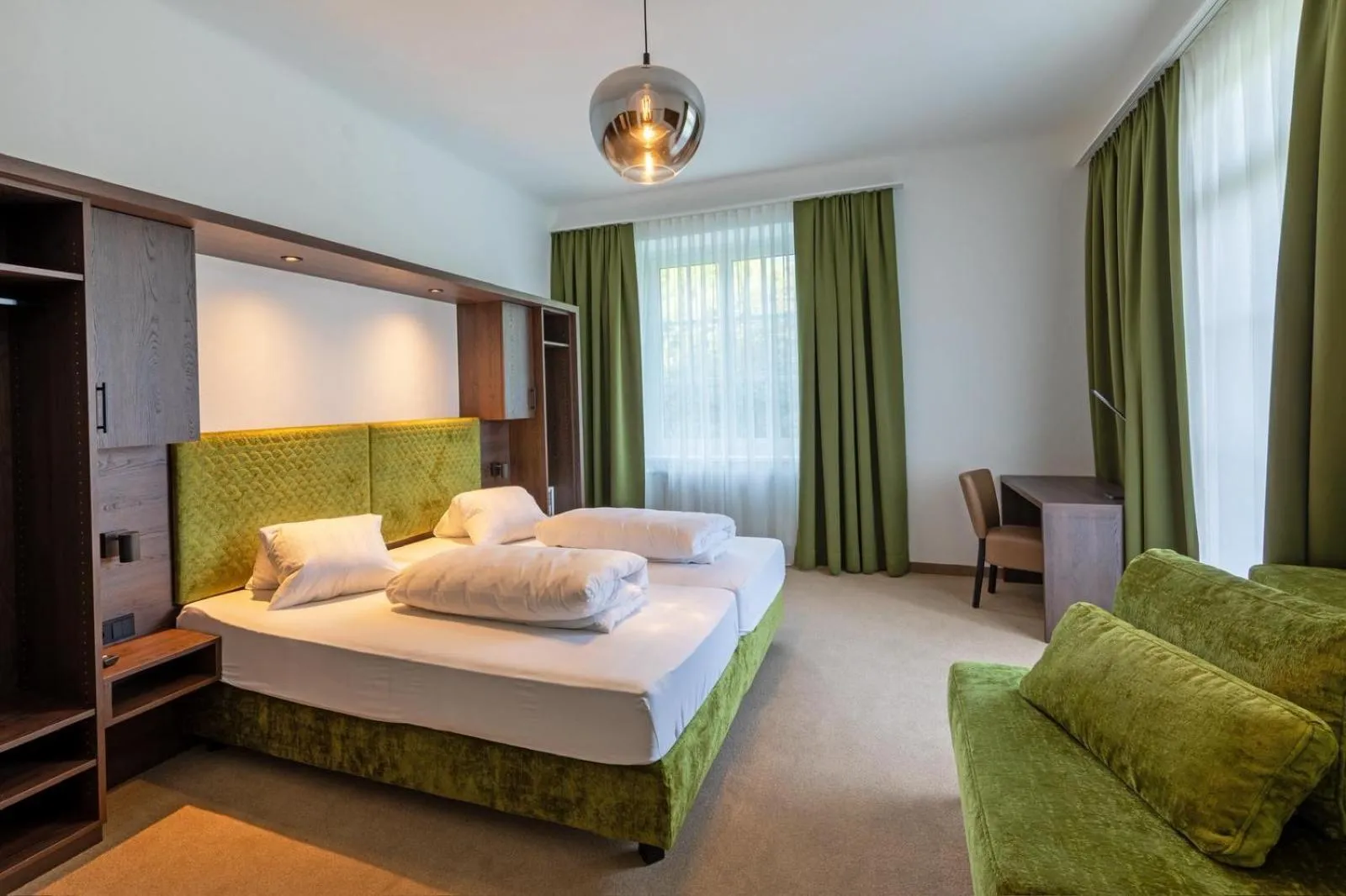 Photo of the whole room, Bed in Hotel Ertl GmbH