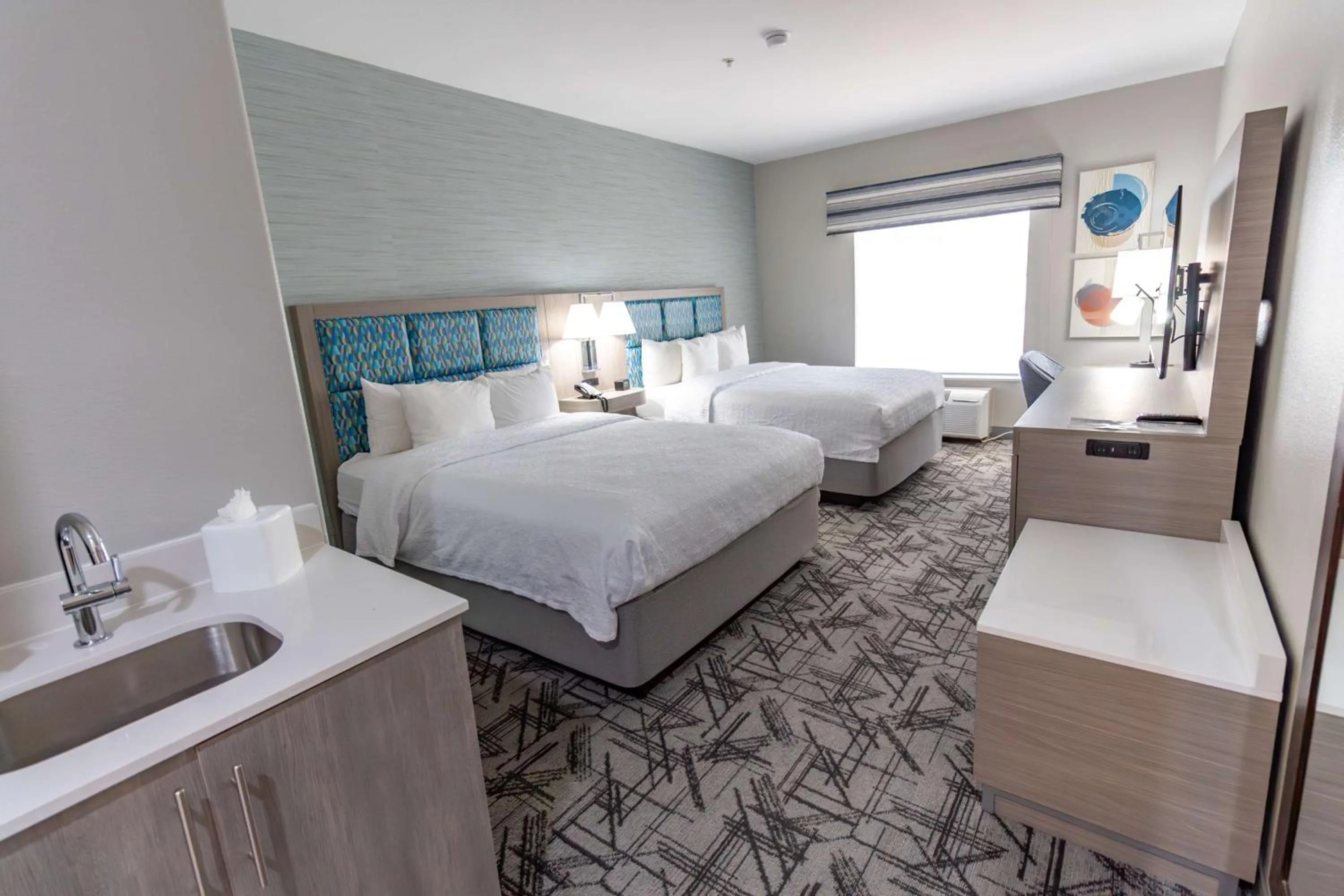 Bed in Hampton Inn & Suites Denton