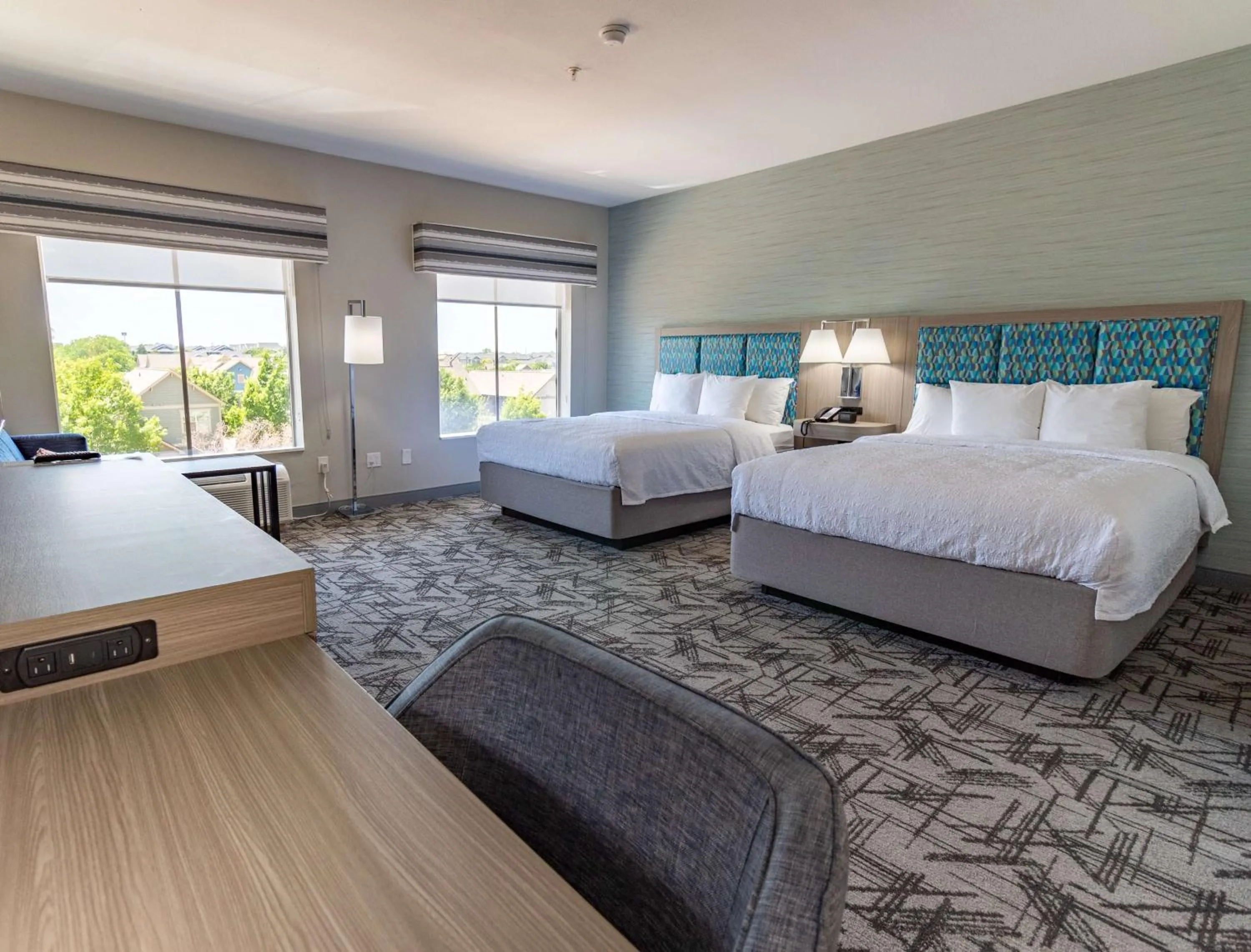 Bed in Hampton Inn & Suites Denton