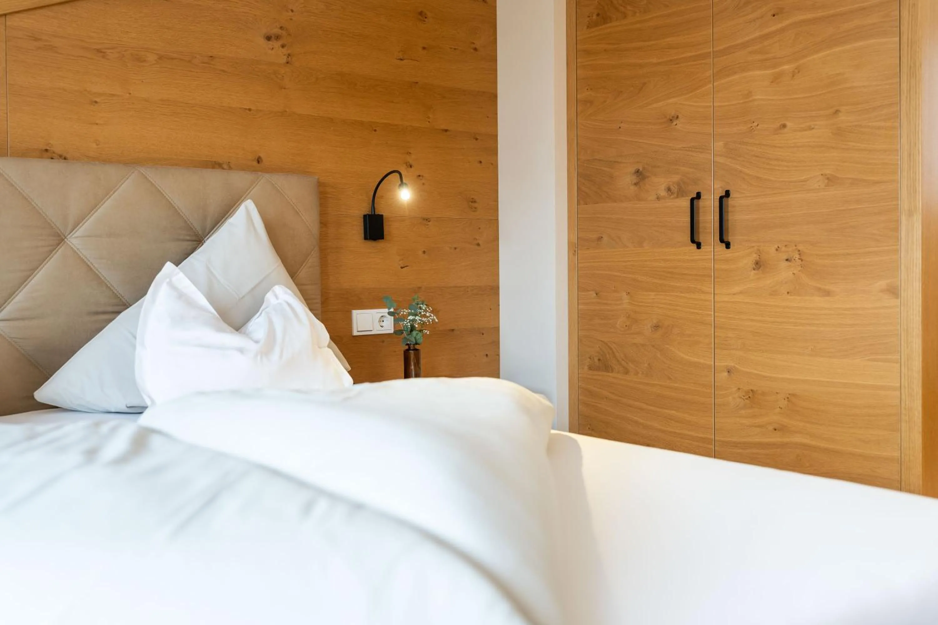 Bed in Hotel zum Hirschen Zell am See