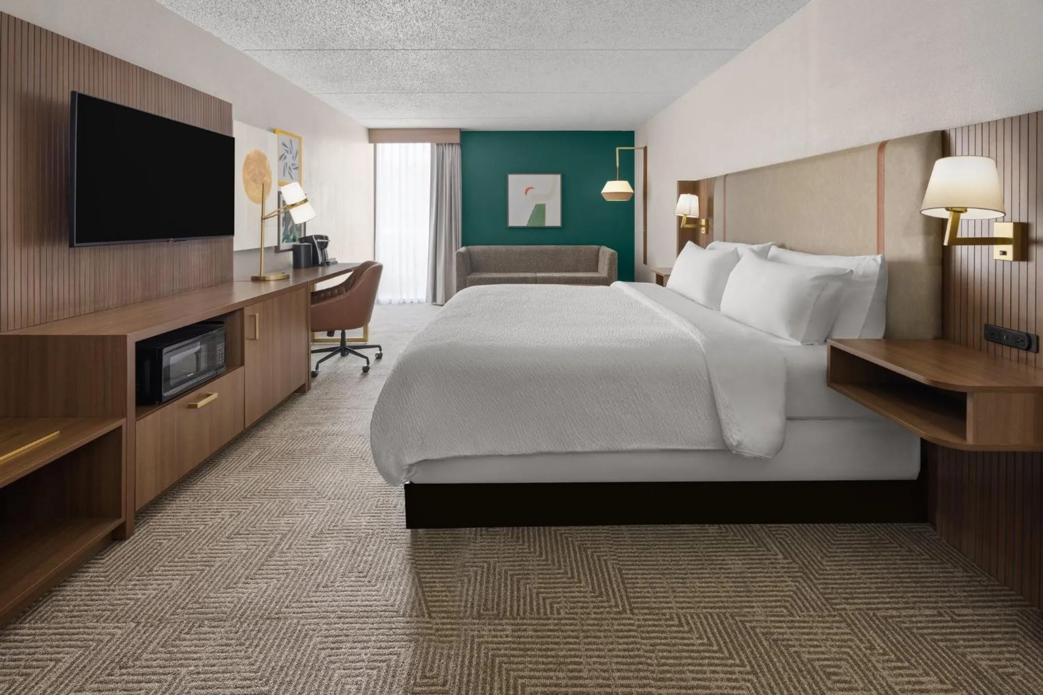 Photo of the whole room, Bed in Holiday Inn Morgantown - Reading Area by IHG