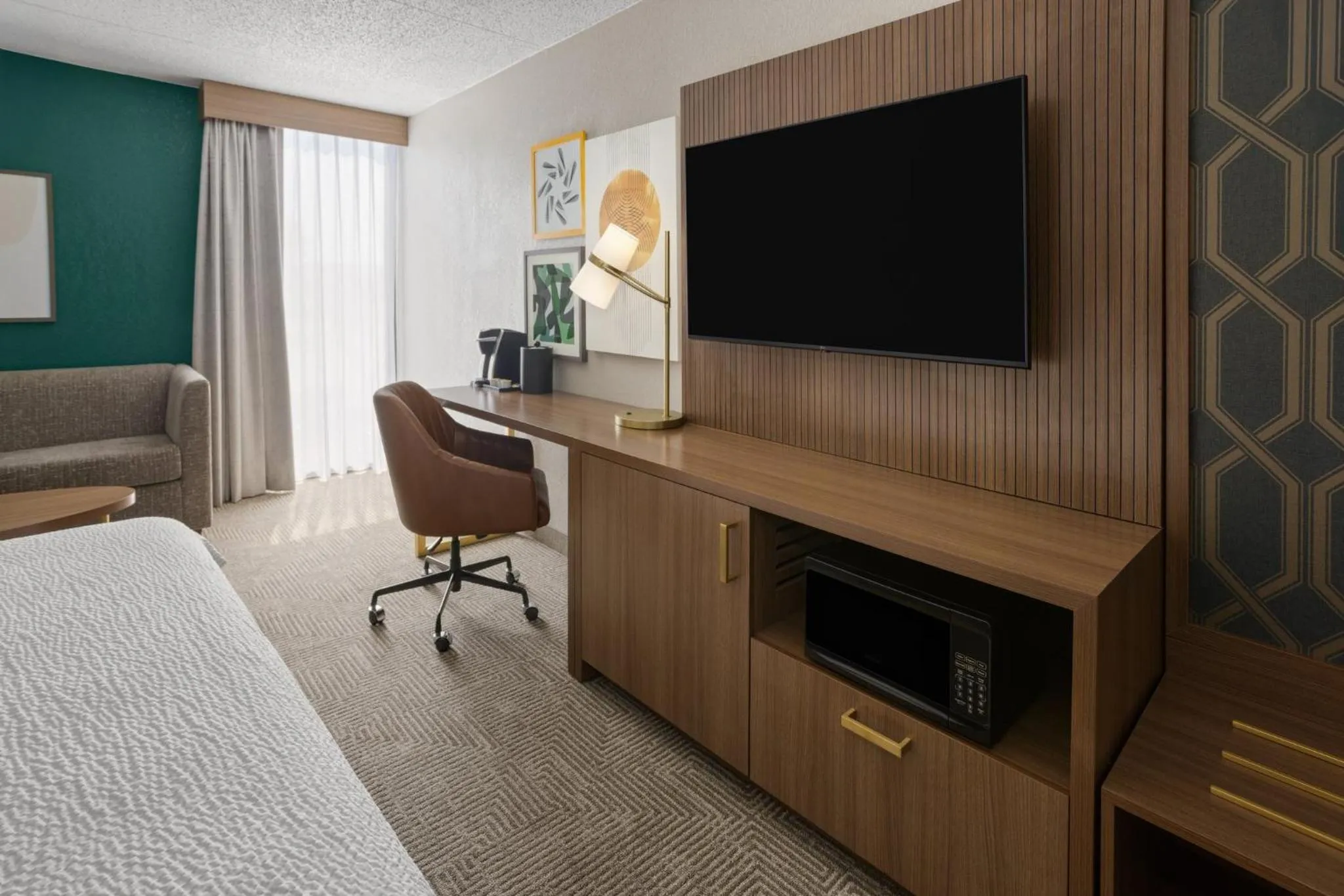 Photo of the whole room, Bed in Holiday Inn Morgantown - Reading Area by IHG