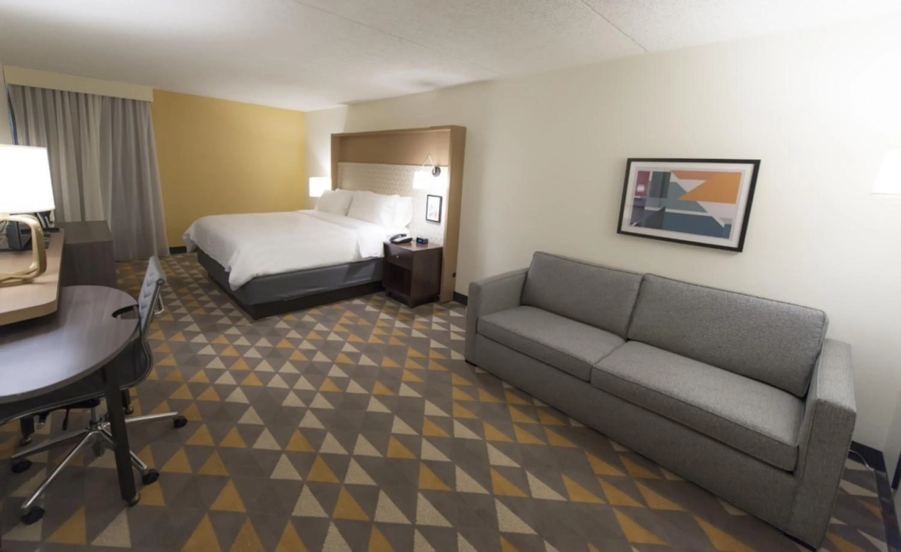 Photo of the whole room, Bed in Holiday Inn Morgantown - Reading Area by IHG