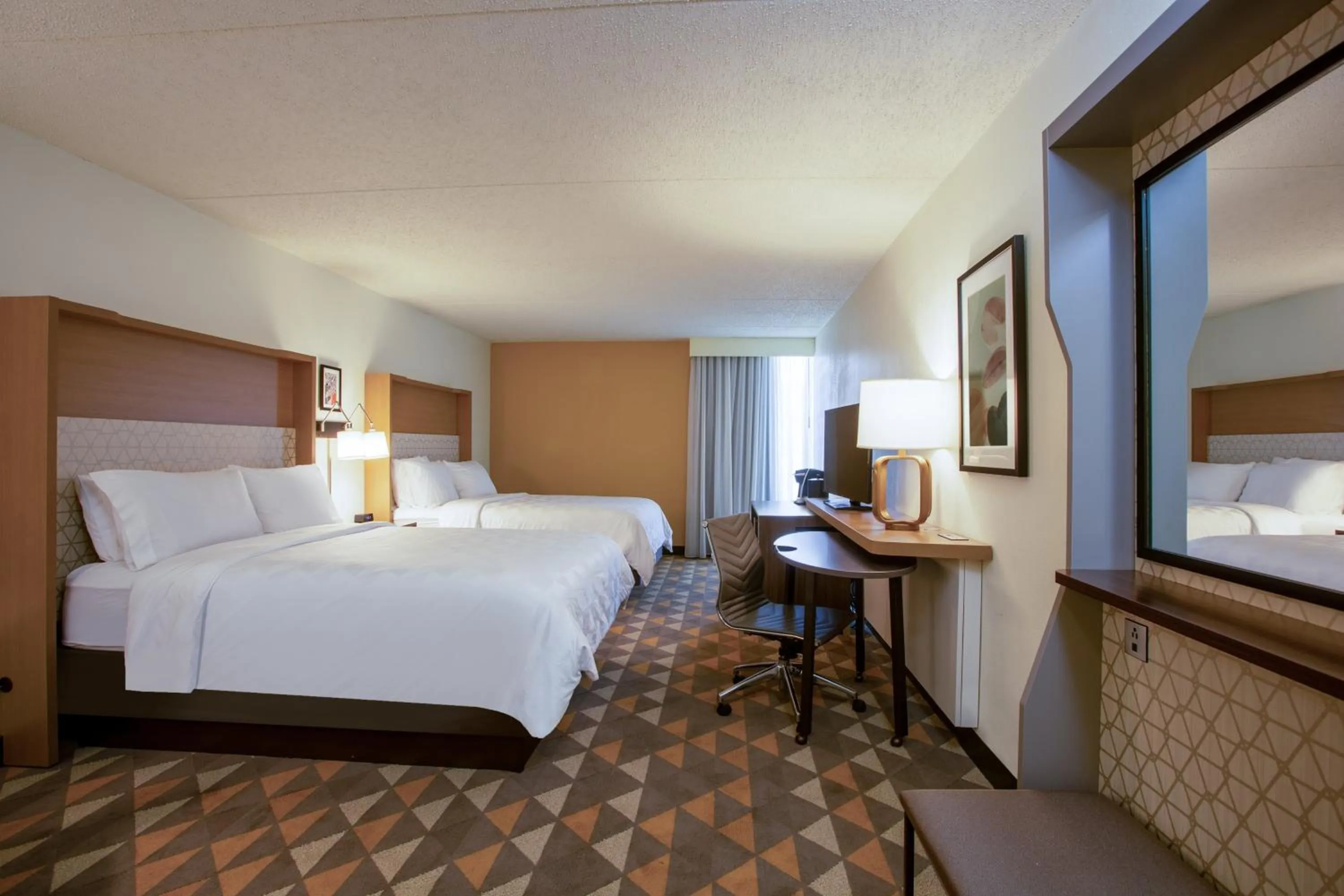 Photo of the whole room, Bed in Holiday Inn Morgantown - Reading Area by IHG