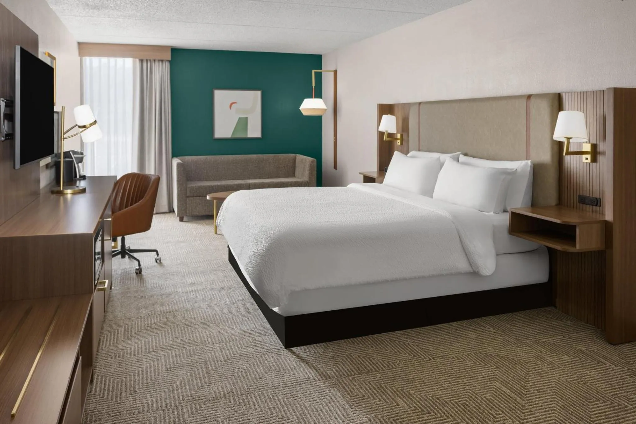 Photo of the whole room, Bed in Holiday Inn Morgantown - Reading Area by IHG