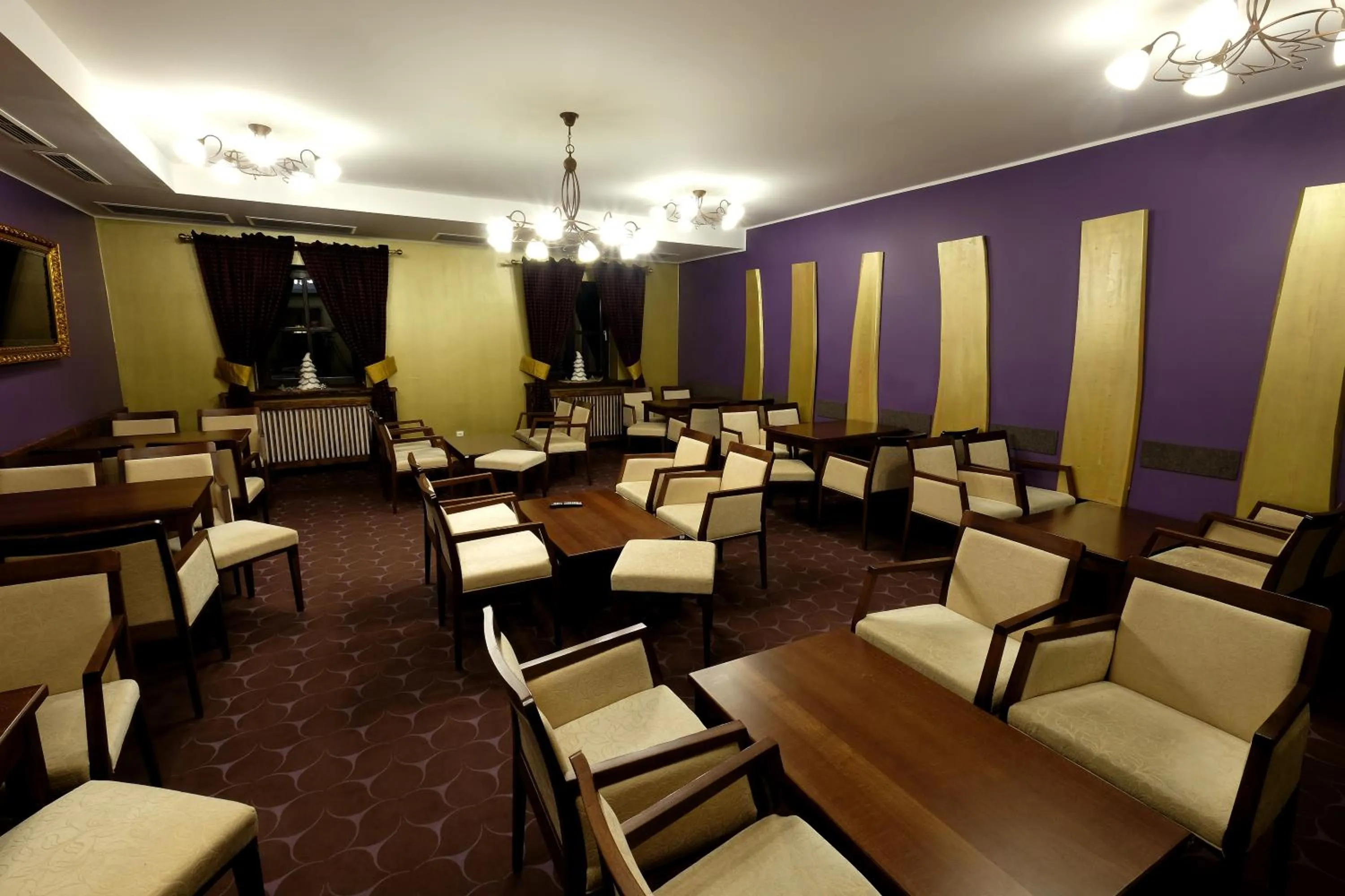 Communal lounge/ TV room in Alpenhotel Marcius