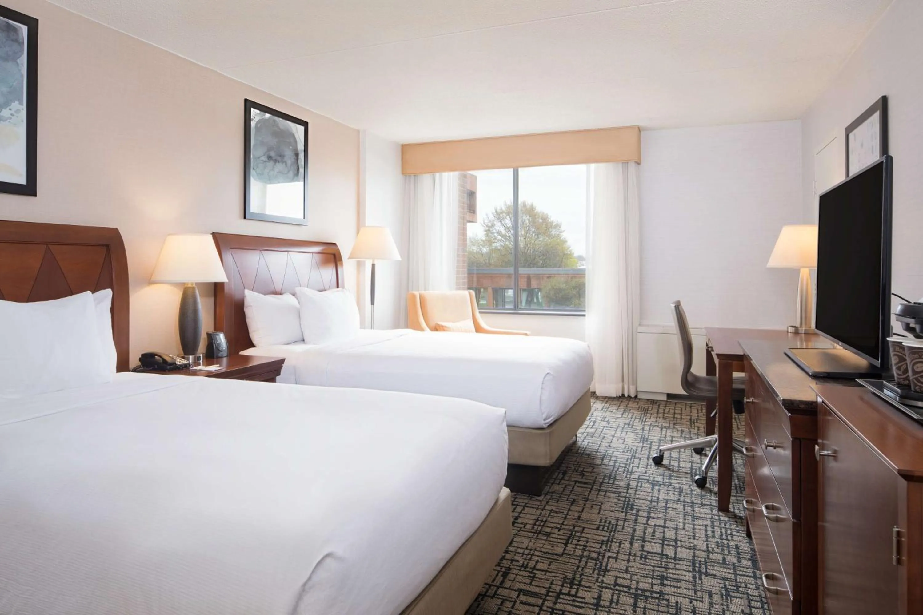 Bed in DoubleTree by Hilton Hotel Syracuse