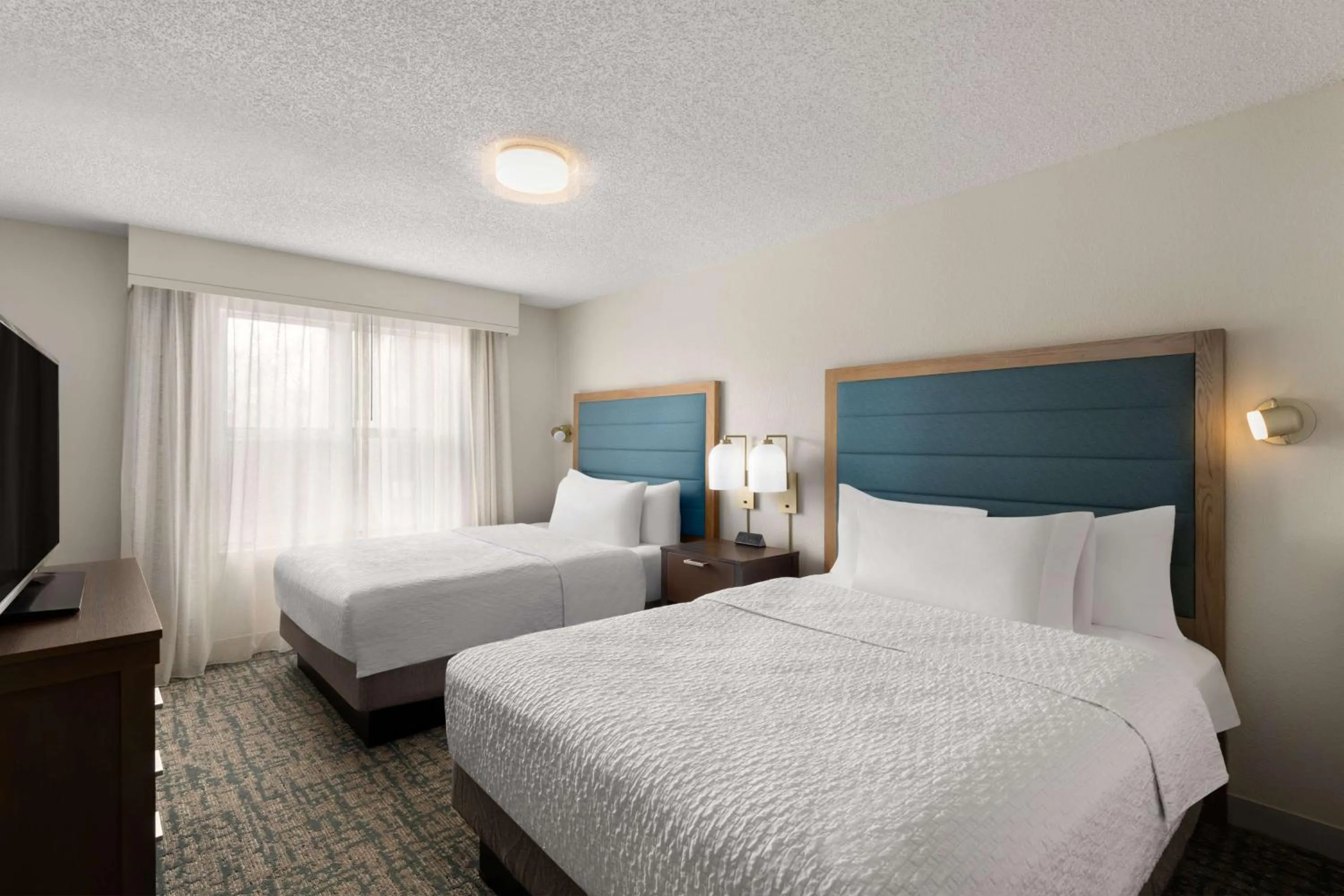 Bed in Homewood Suites by Hilton Lake Mary Orlando North