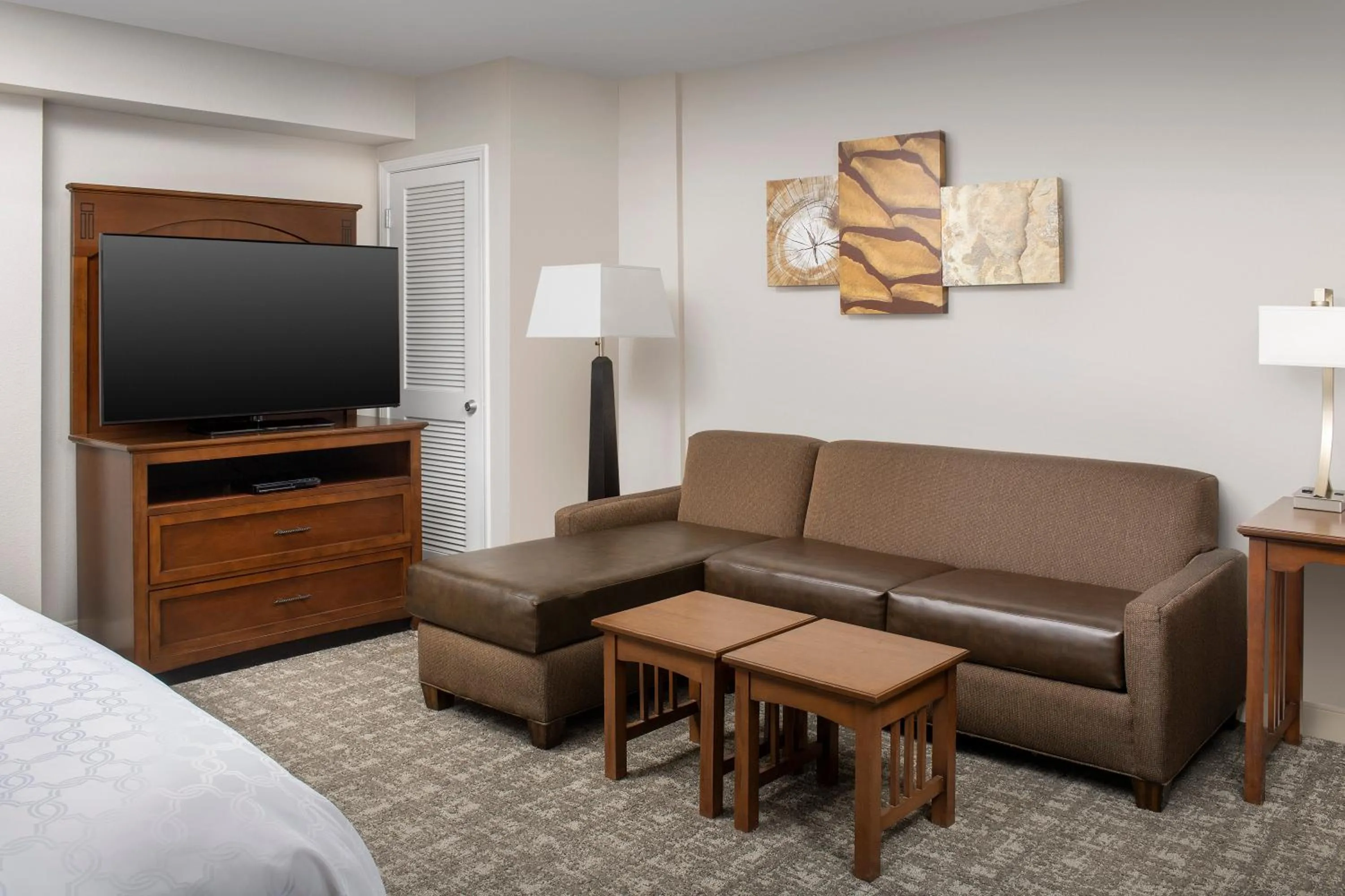 Seating area, Bed in Staybridge Suites North Charleston by IHG