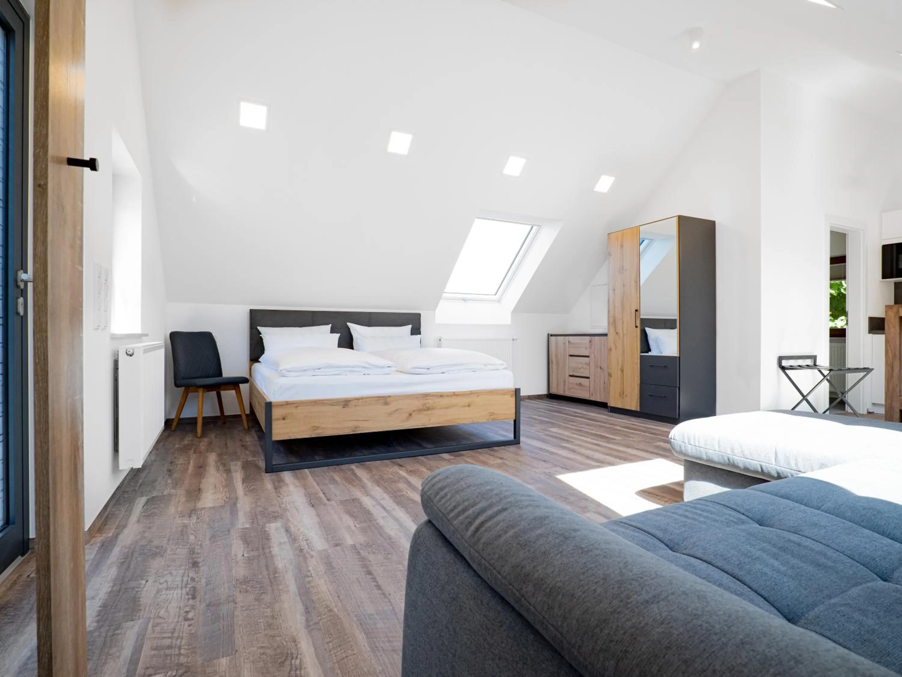 Living room, Bed in Landhotel Kirchberg